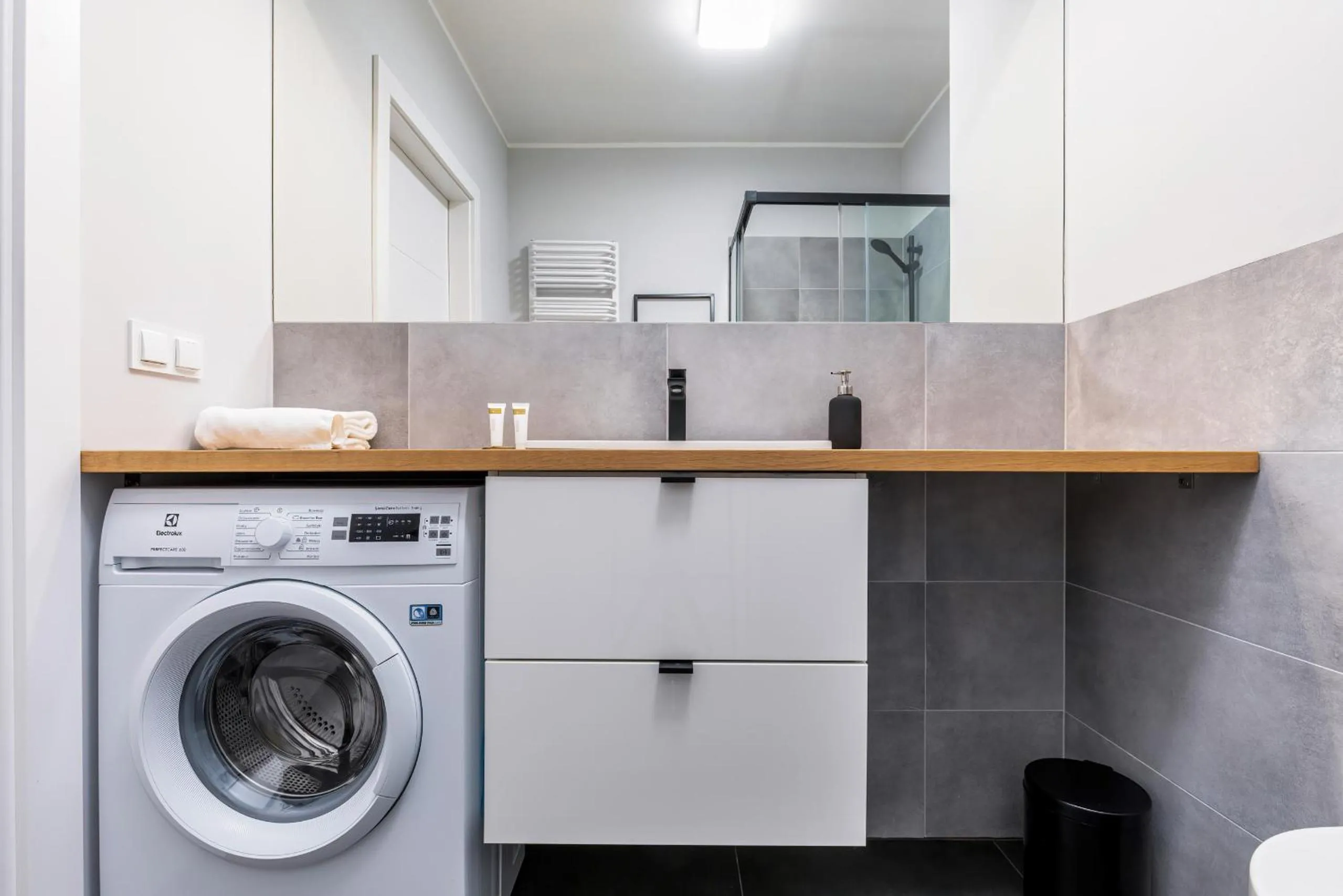 Bathroom in Modern City Center Apartments by Noclegi Renters