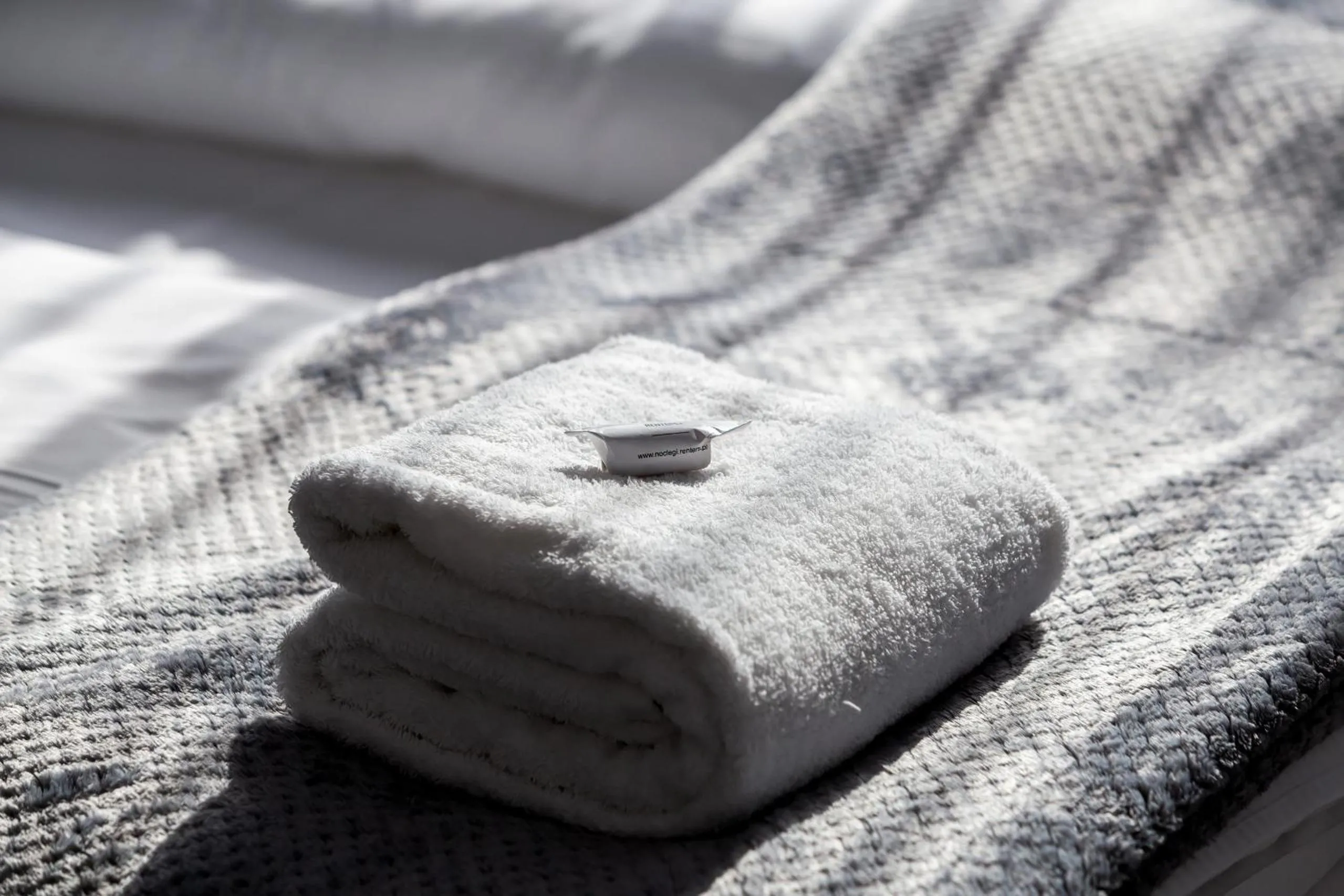 Decorative detail, Bed in Modern City Center Apartments by Noclegi Renters
