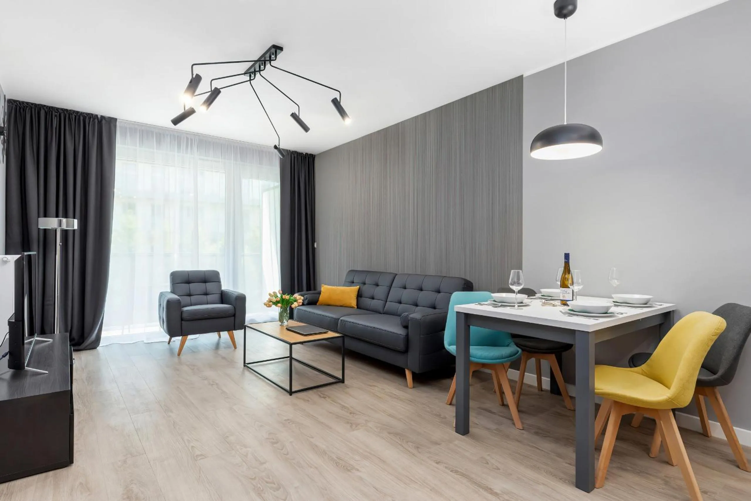 Living room in Modern City Center Apartments by Noclegi Renters