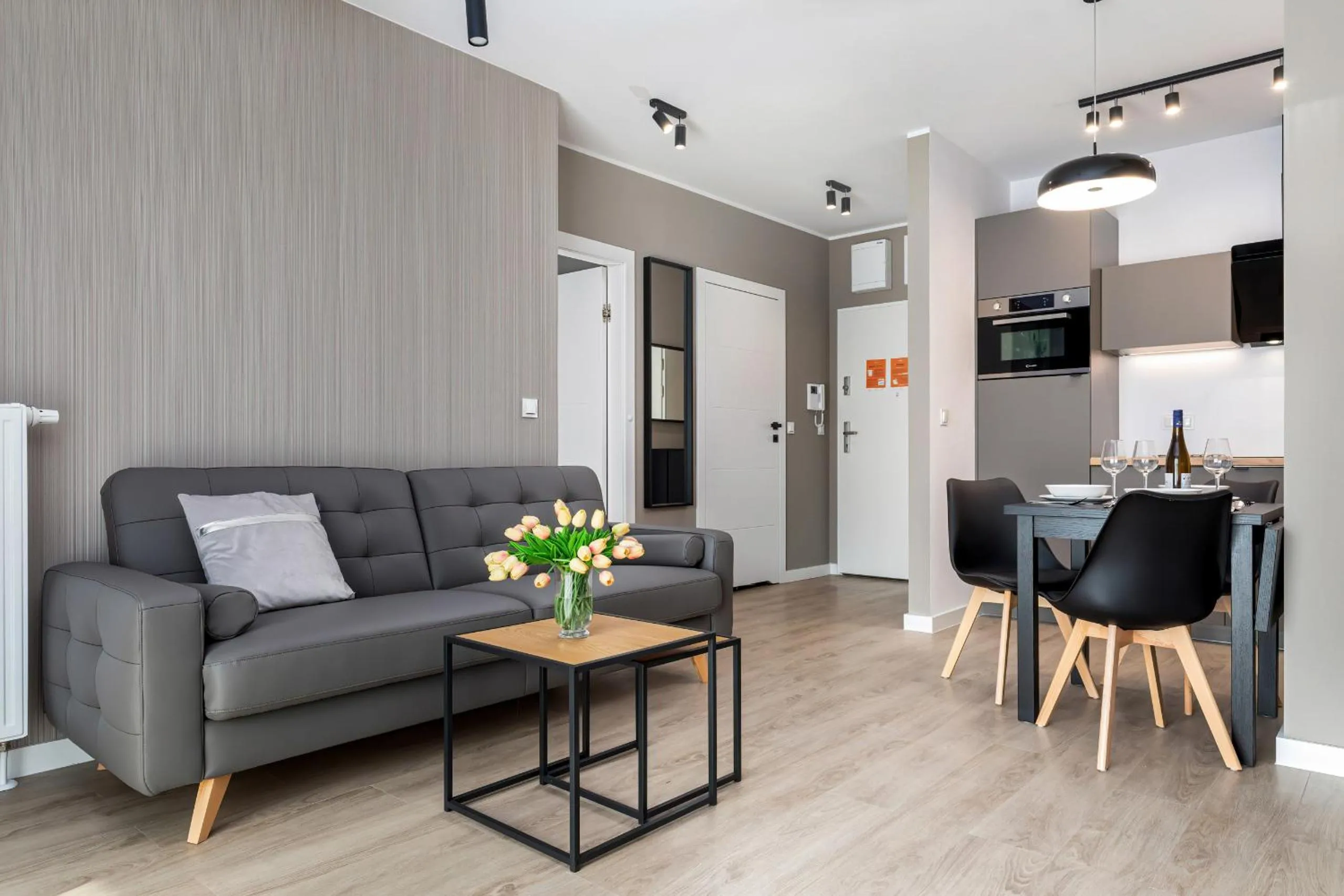 Living room in Modern City Center Apartments by Noclegi Renters