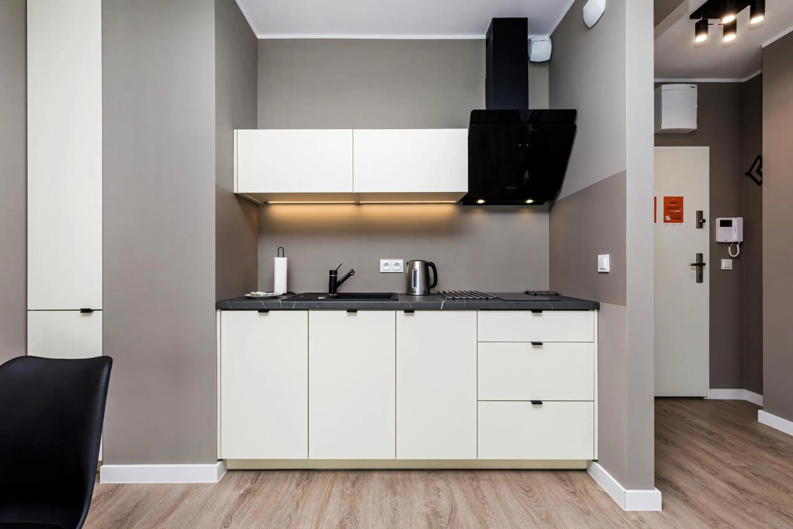 Kitchen or kitchenette in Modern City Center Apartments by Noclegi Renters