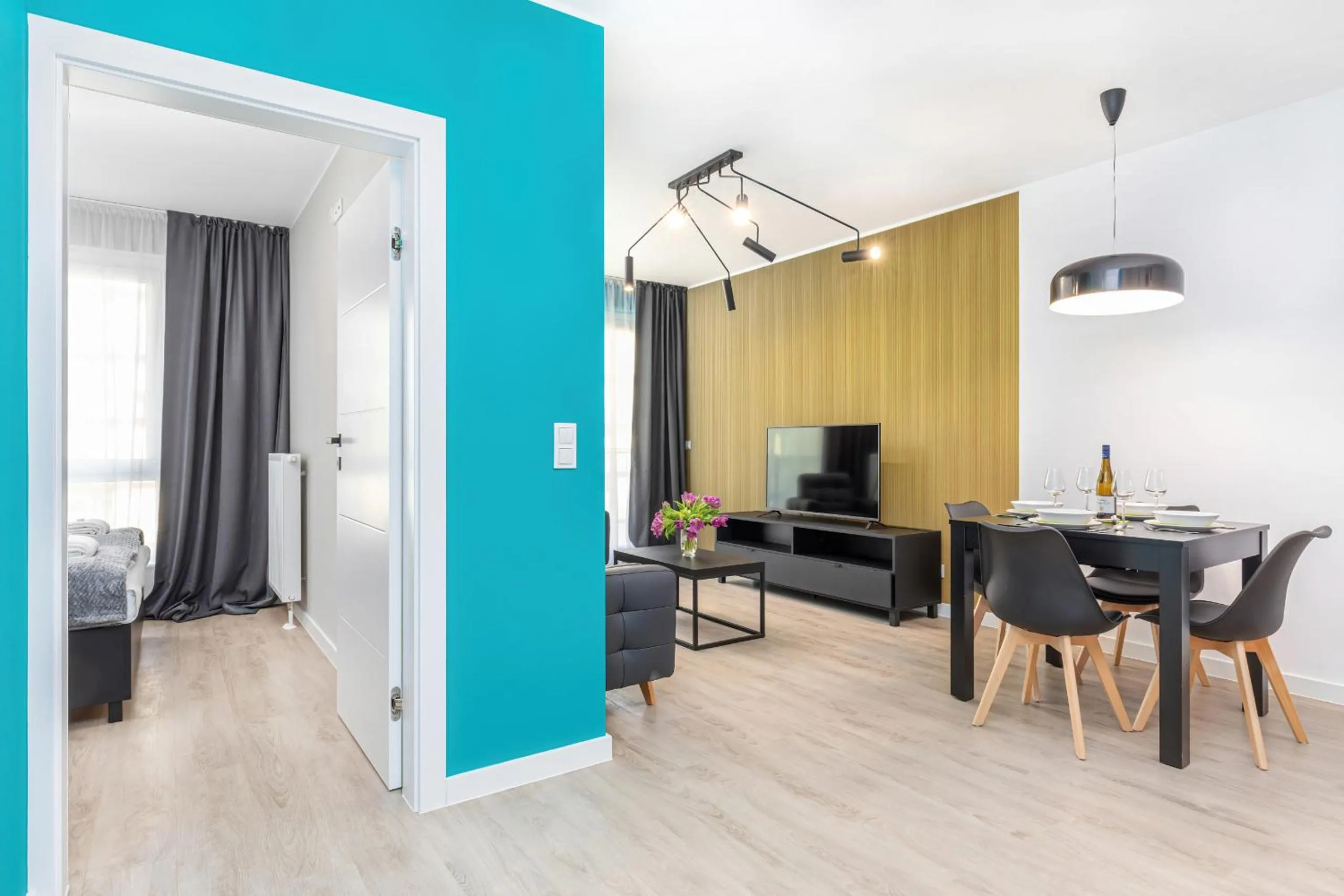 Living room in Modern City Center Apartments by Noclegi Renters