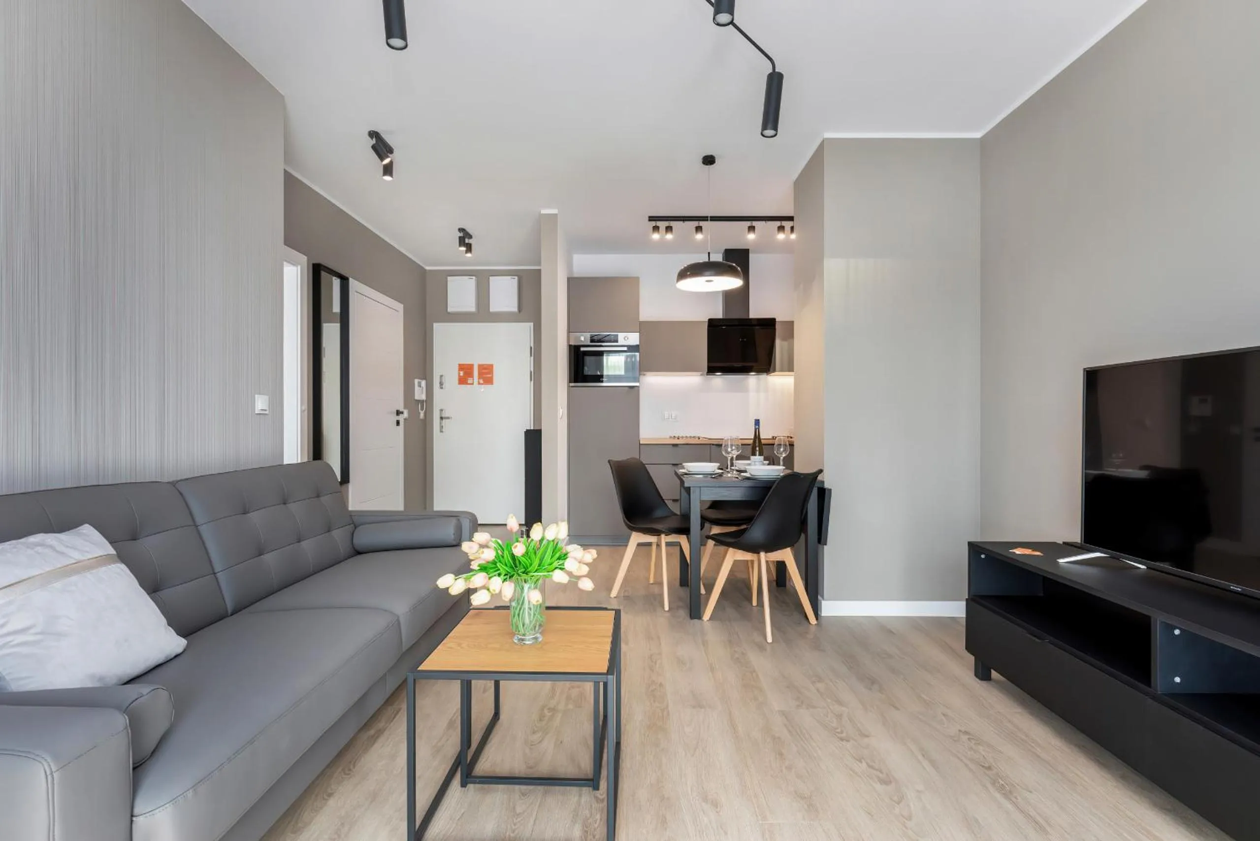 Living room in Modern City Center Apartments by Noclegi Renters