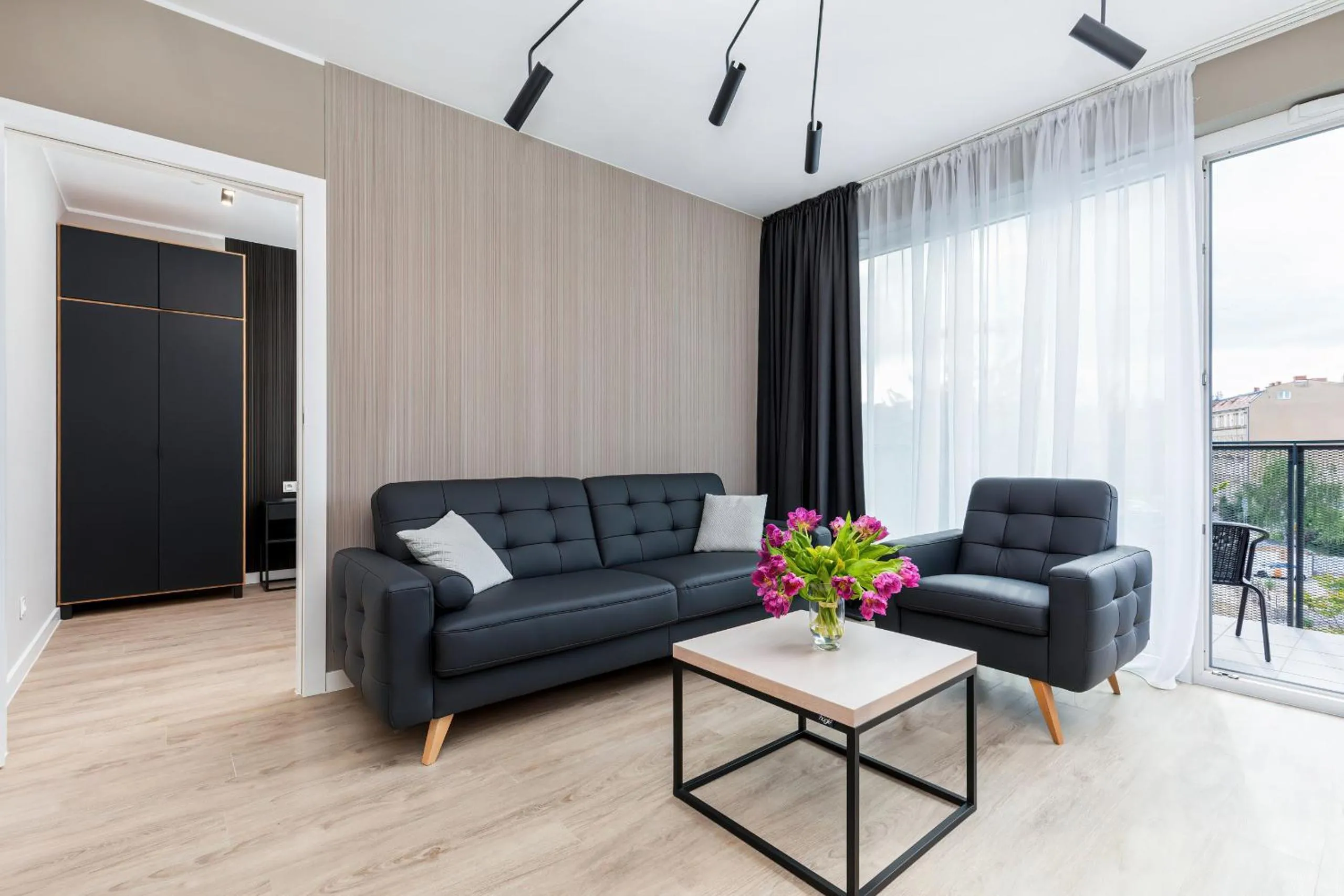 Living room in Modern City Center Apartments by Noclegi Renters