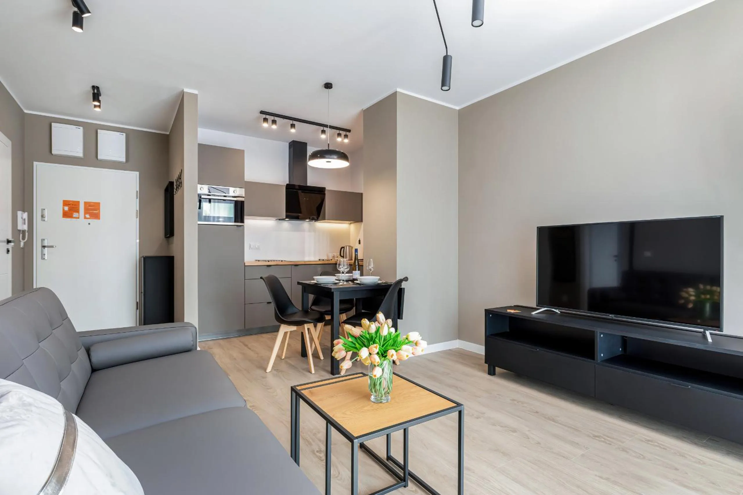 Living room in Modern City Center Apartments by Noclegi Renters