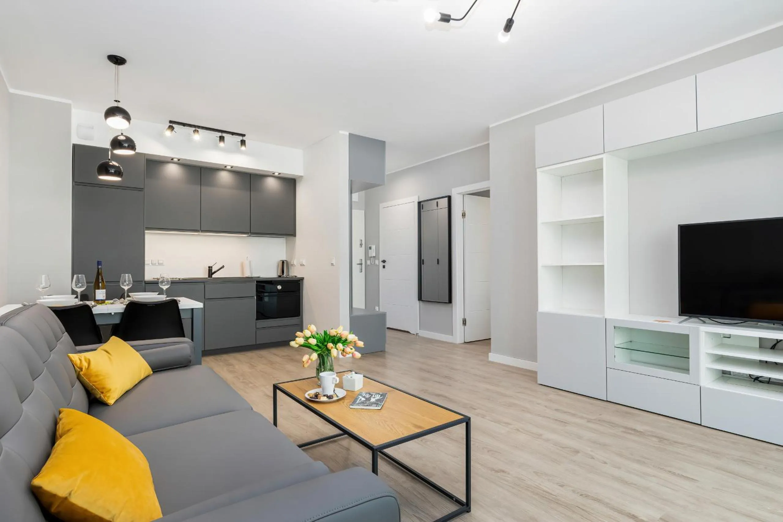 Living room in Modern City Center Apartments by Noclegi Renters