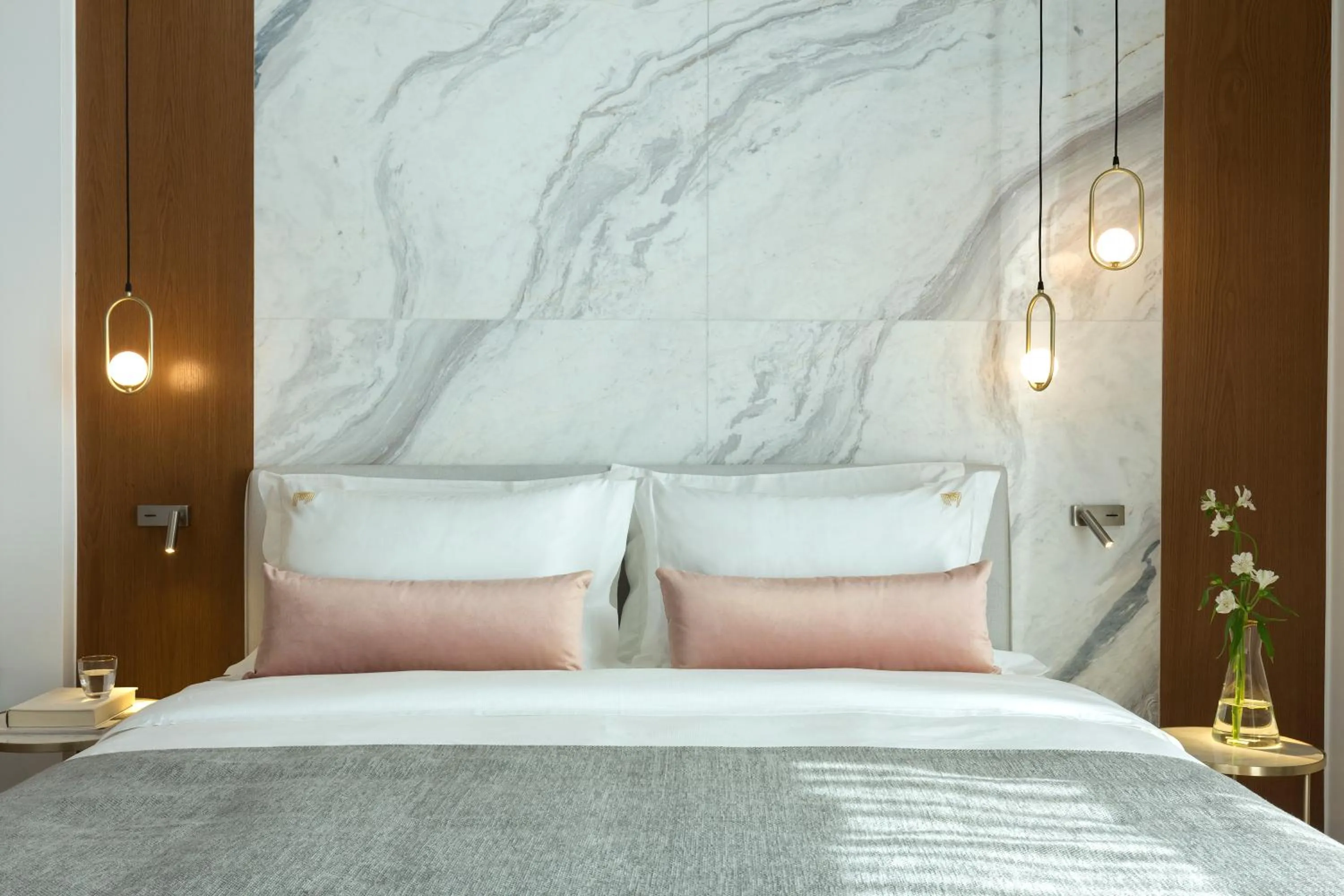 Bed in Mirabile Luxury Suites