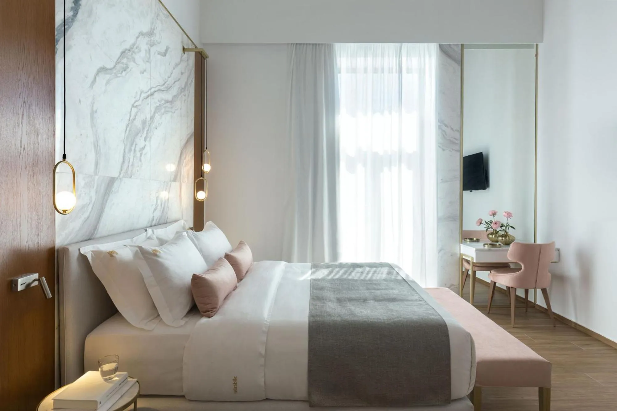 Bed in Mirabile Luxury Suites