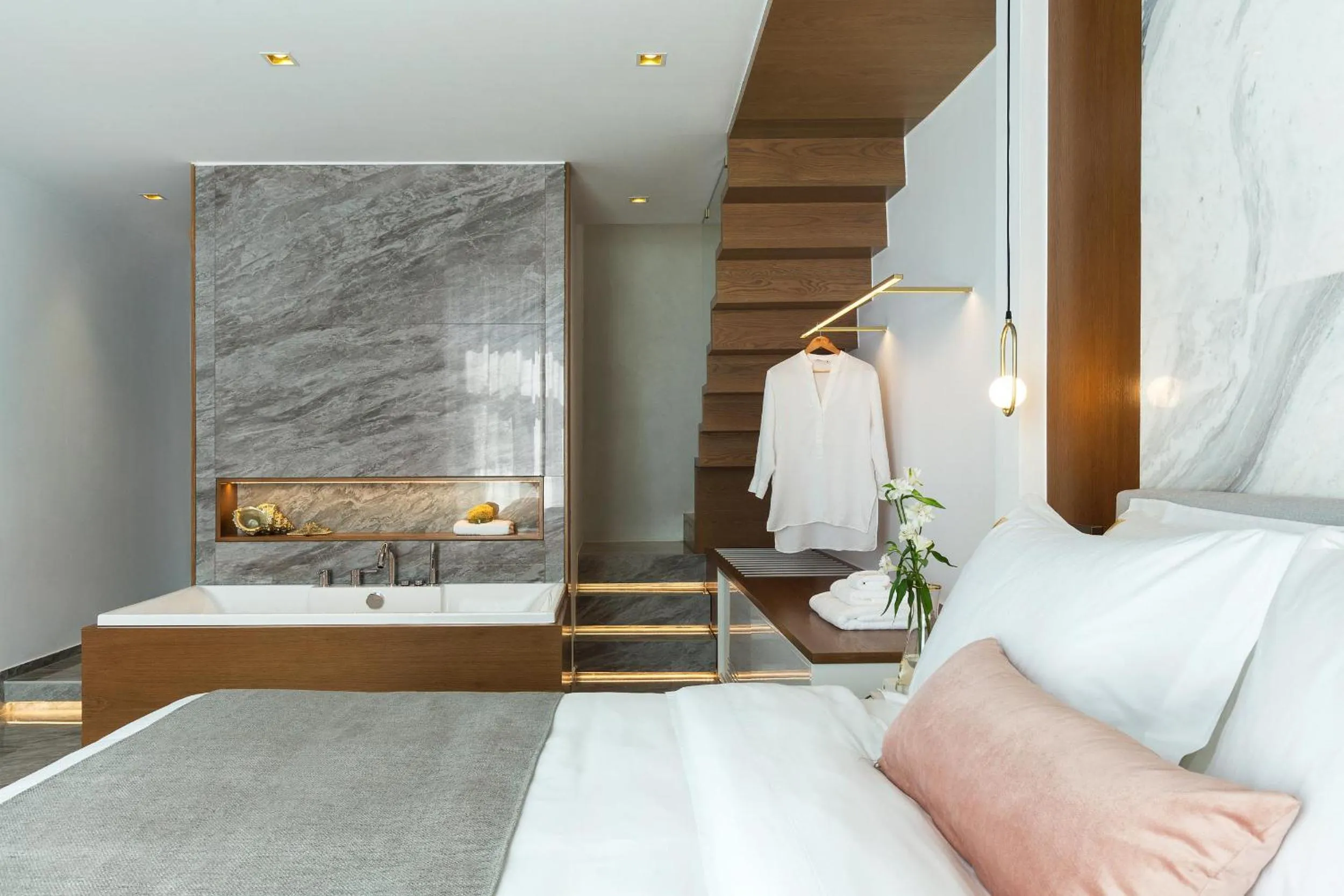 Bed in Mirabile Luxury Suites