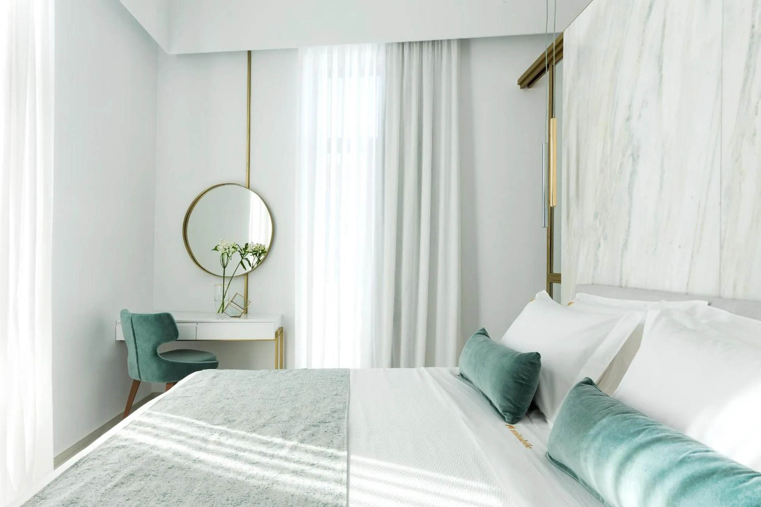 Bed in Mirabile Luxury Suites