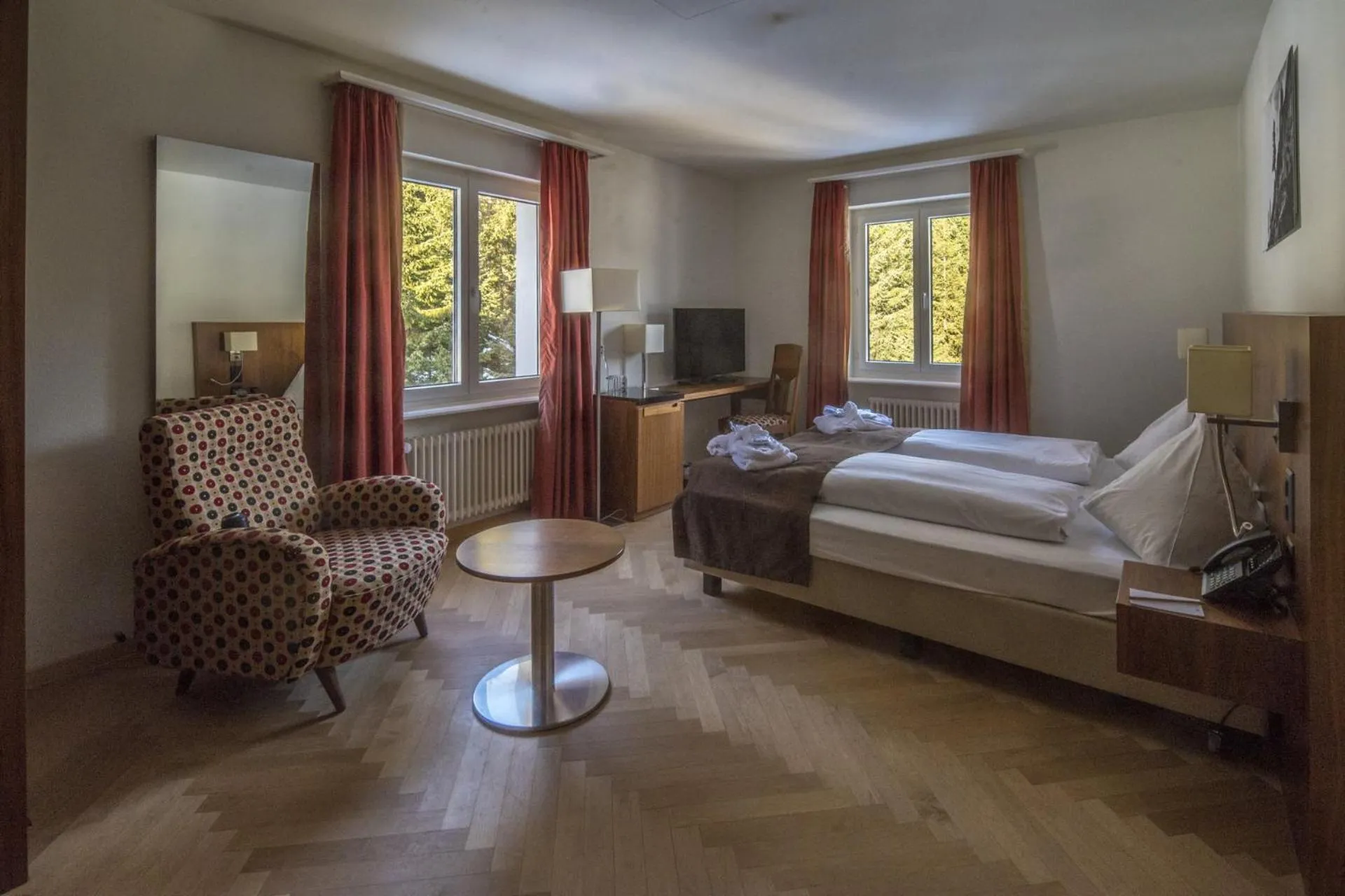 Photo of the whole room, Bed in Waldhotel & SPA Davos - for body & soul