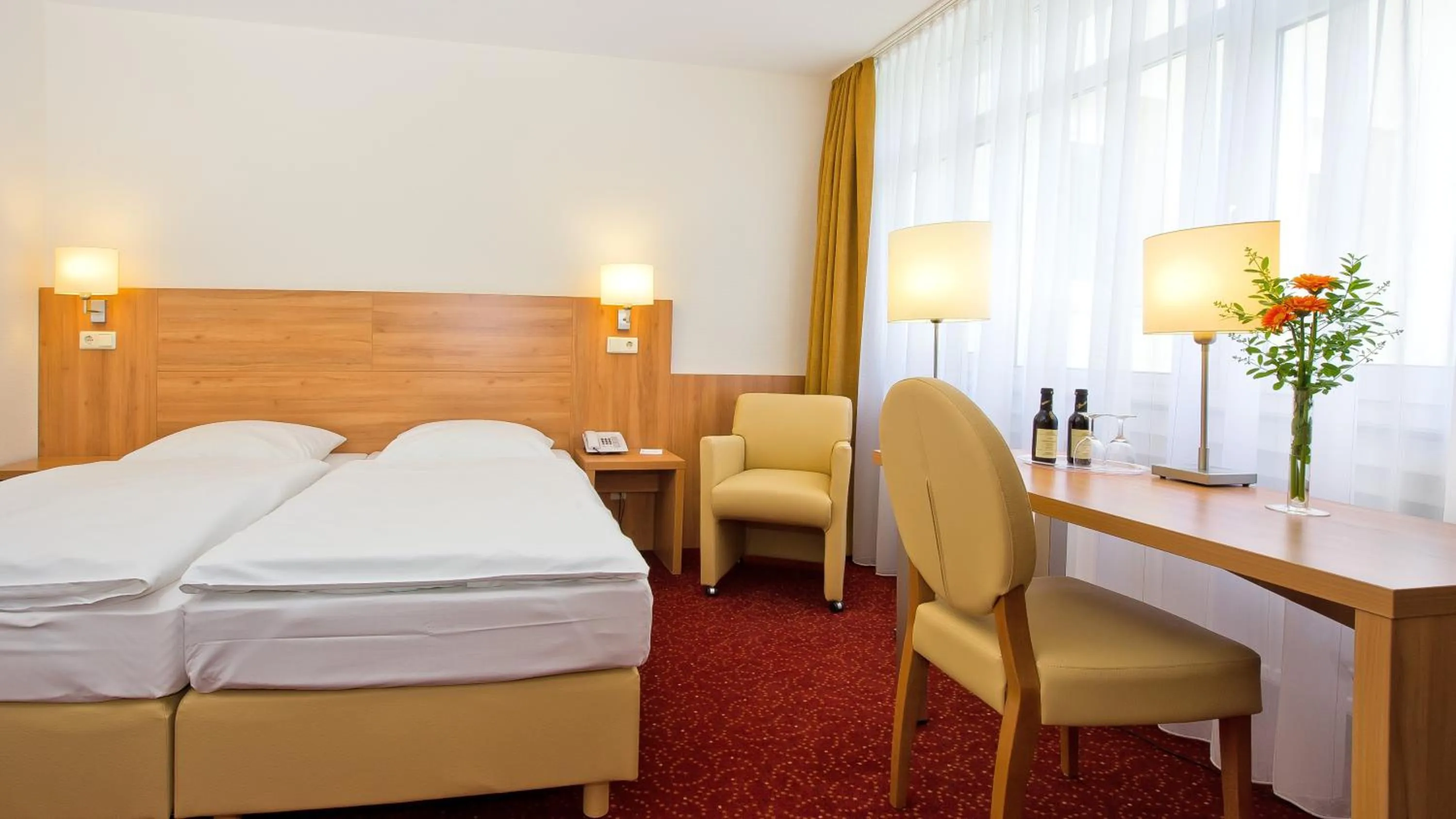 Photo of the whole room, Bed in Ringhotel Haus Oberwinter