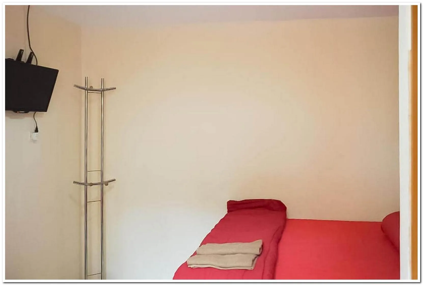 Bed in Pondok Malabar Mitra RedDoorz