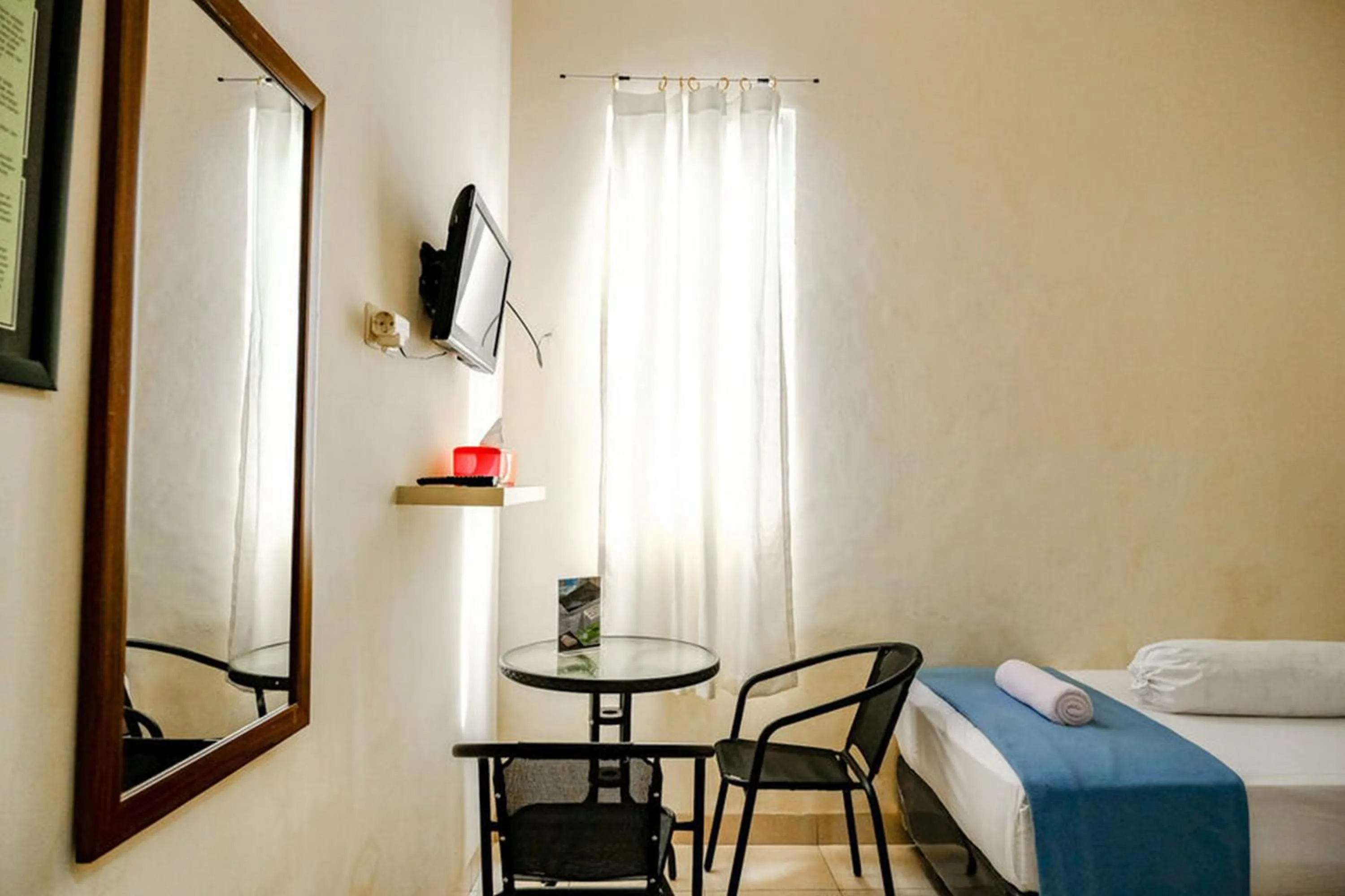 Bed in Pondok Malabar Mitra RedDoorz