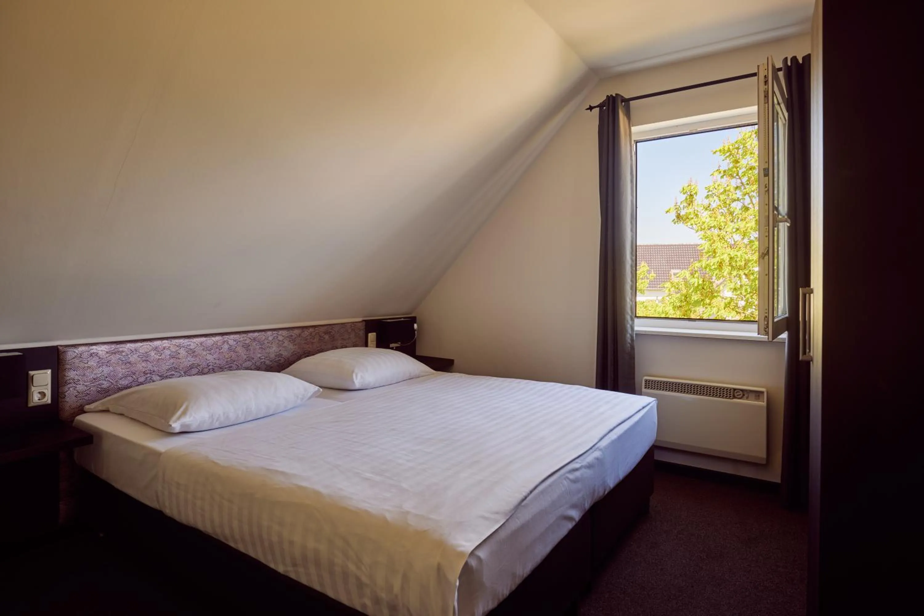 Bed in Van der Valk Resort Linstow