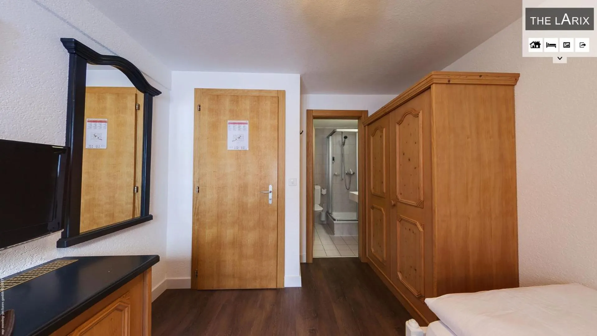 Bathroom, Bed in Hotel THE LARIX ski-in ski-out