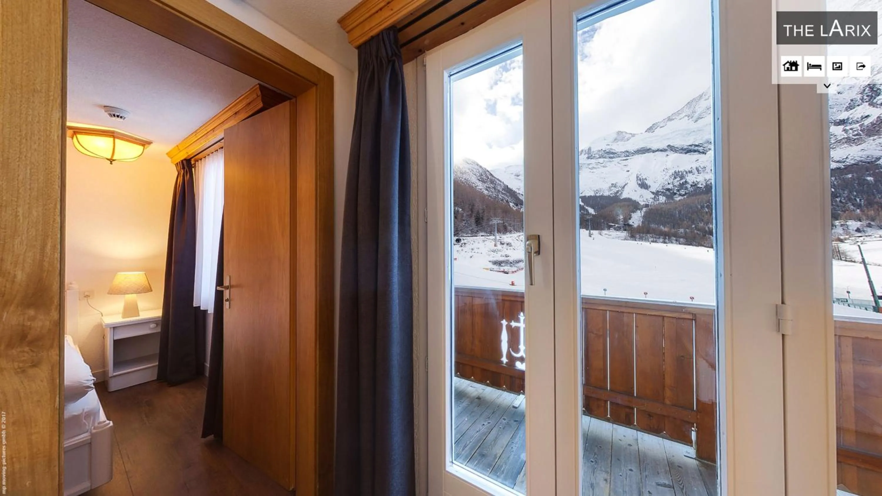 Bedroom in Hotel THE LARIX ski-in ski-out