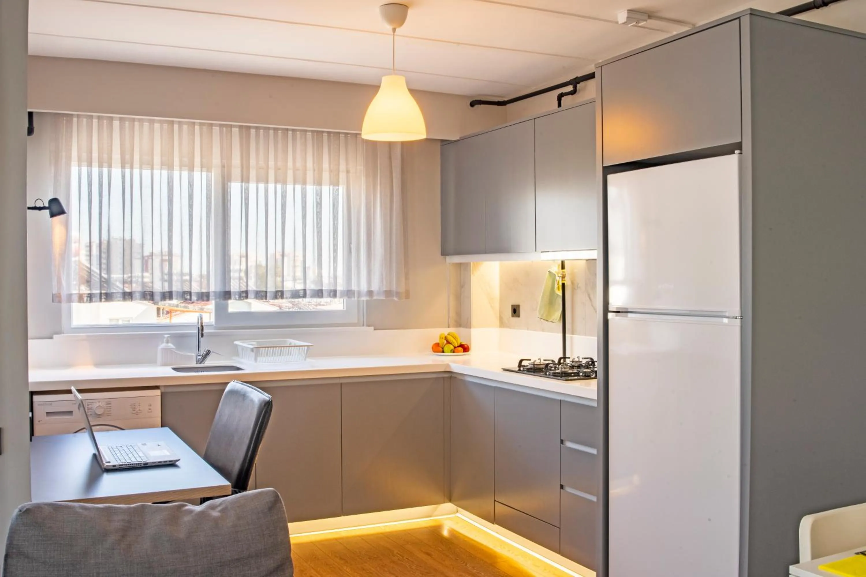 Kitchen or kitchenette in Stile Suite Family Hotel