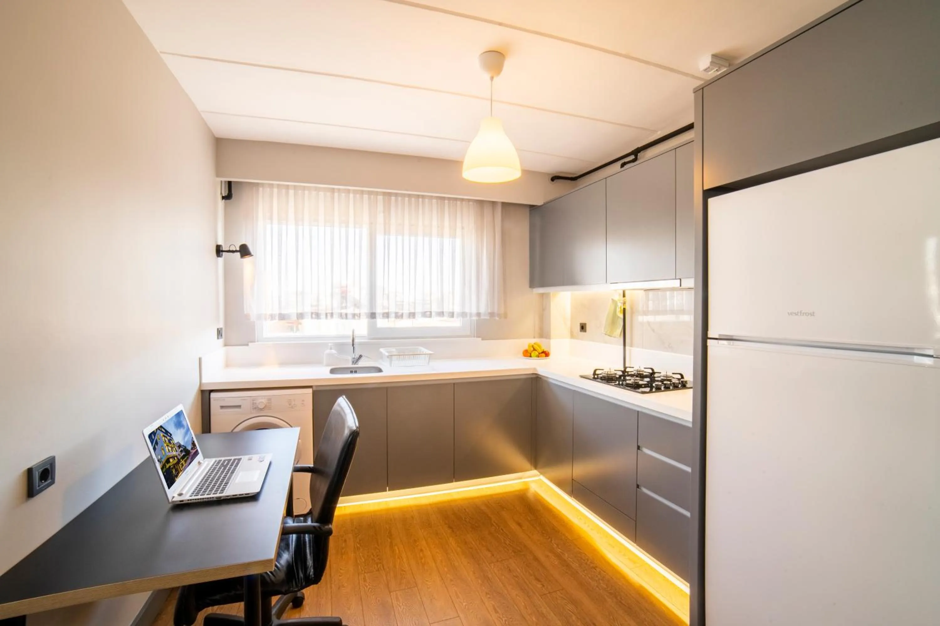 Kitchen or kitchenette in Stile Suite Family Hotel