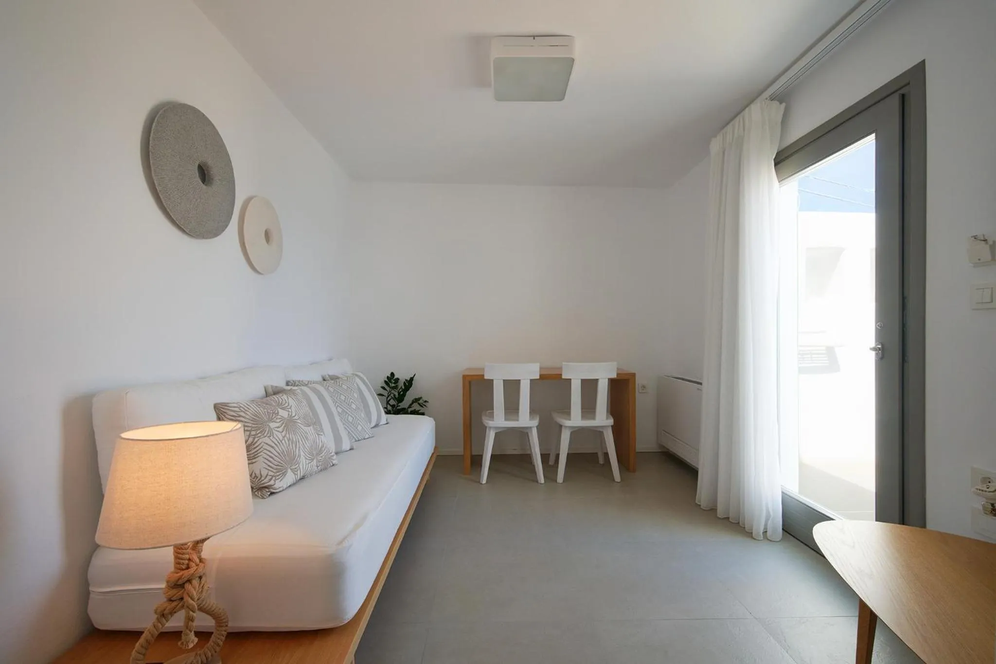 Living room, Bed in Kymo Luxury Suites Paros