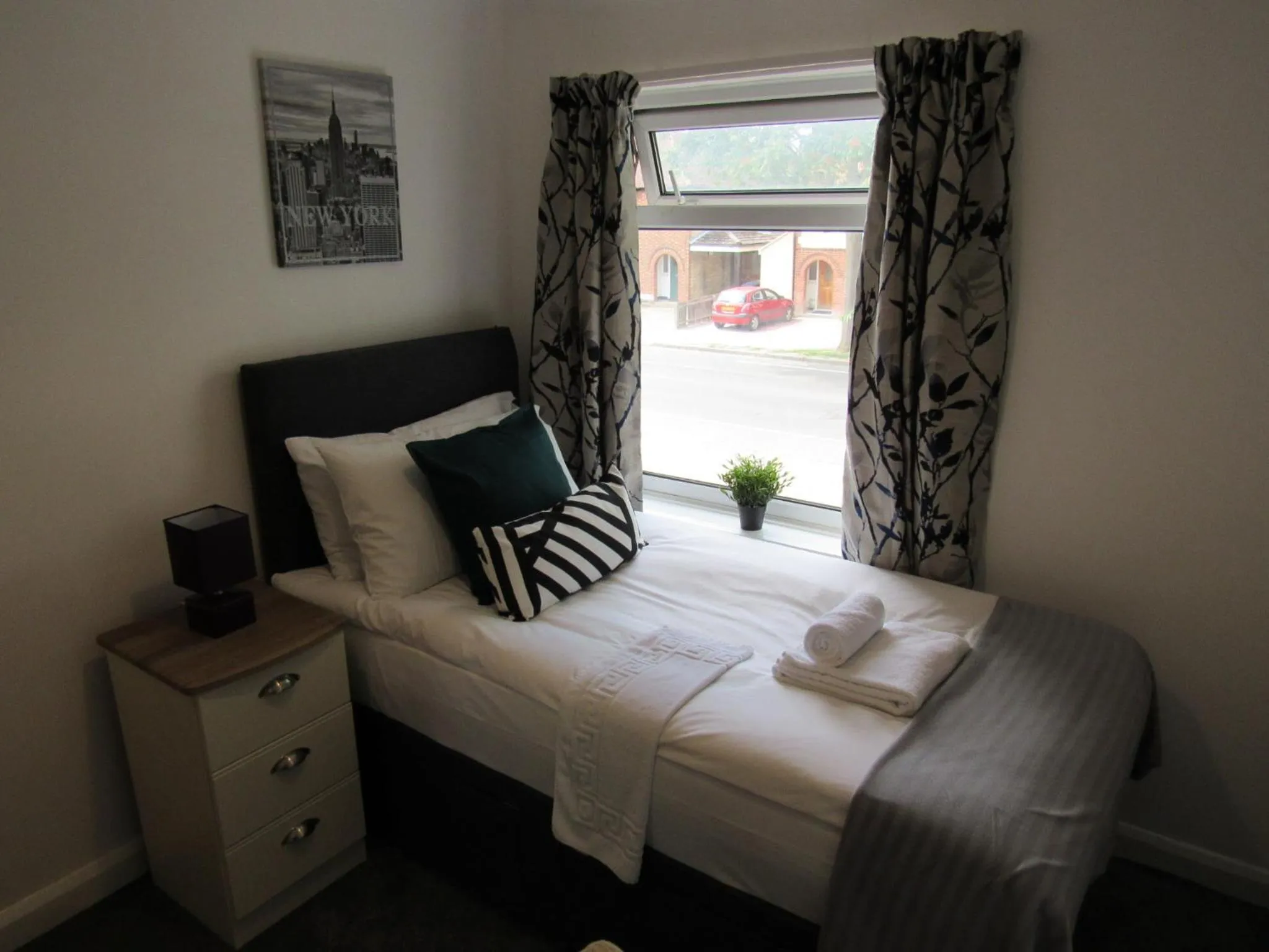 Bed in The Cambridge Suites - Tas Accommodations