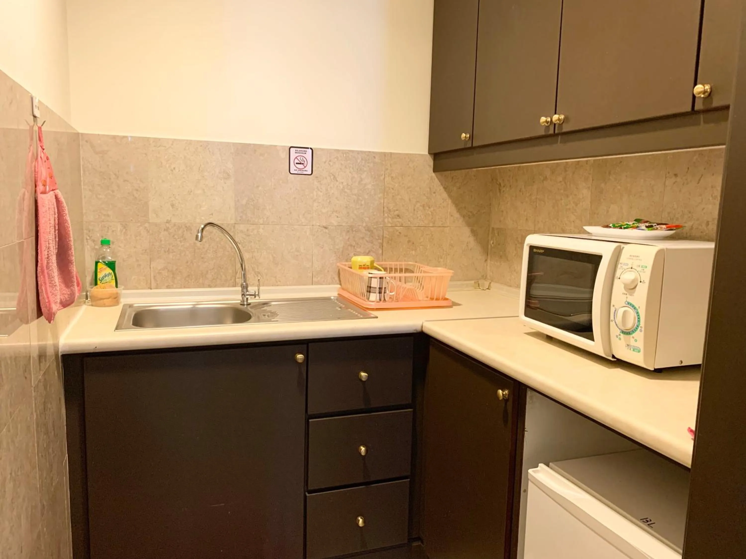Kitchen or kitchenette in KL Universal Suites at Times Square