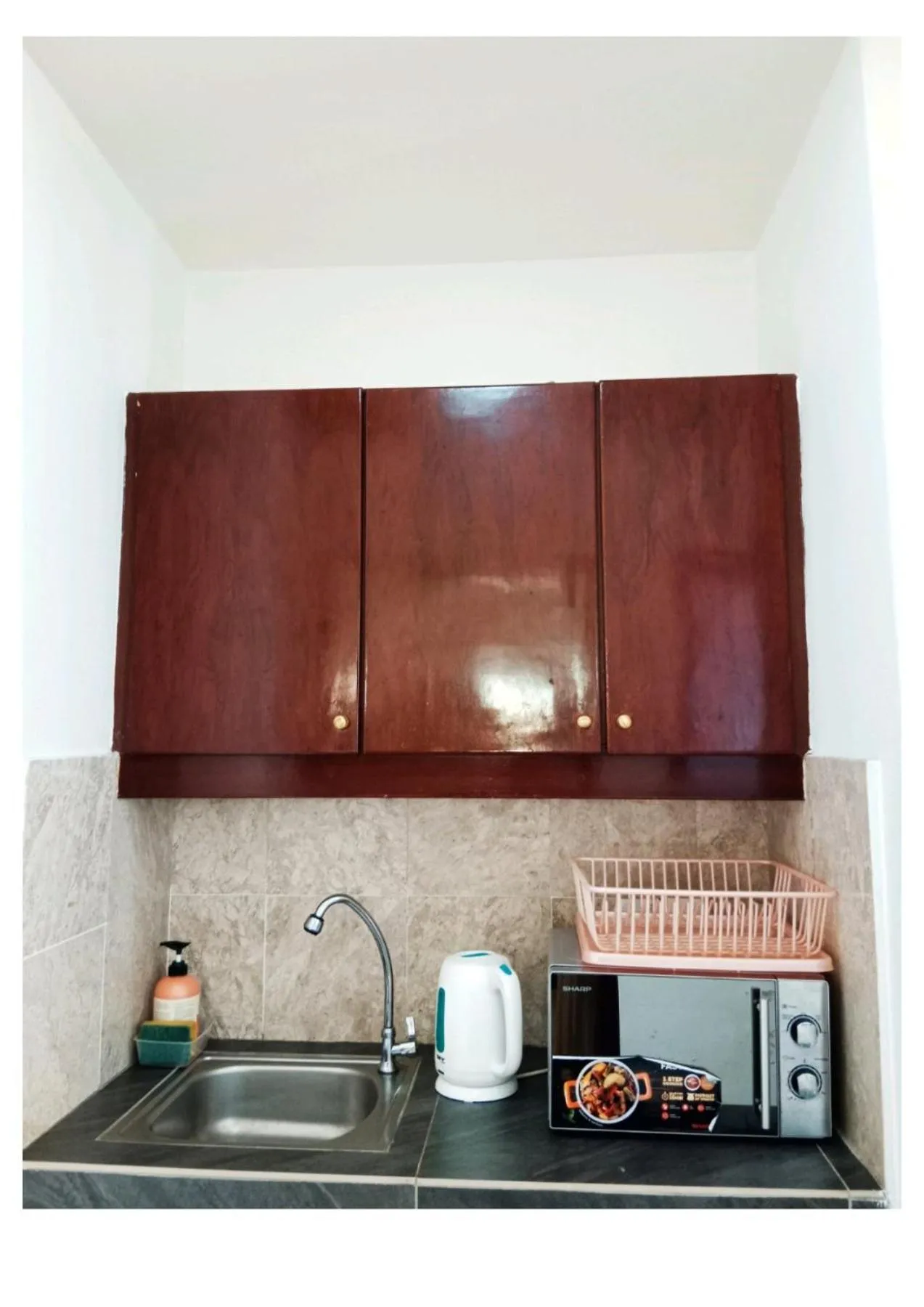 Kitchen or kitchenette in KL Universal Suites at Times Square