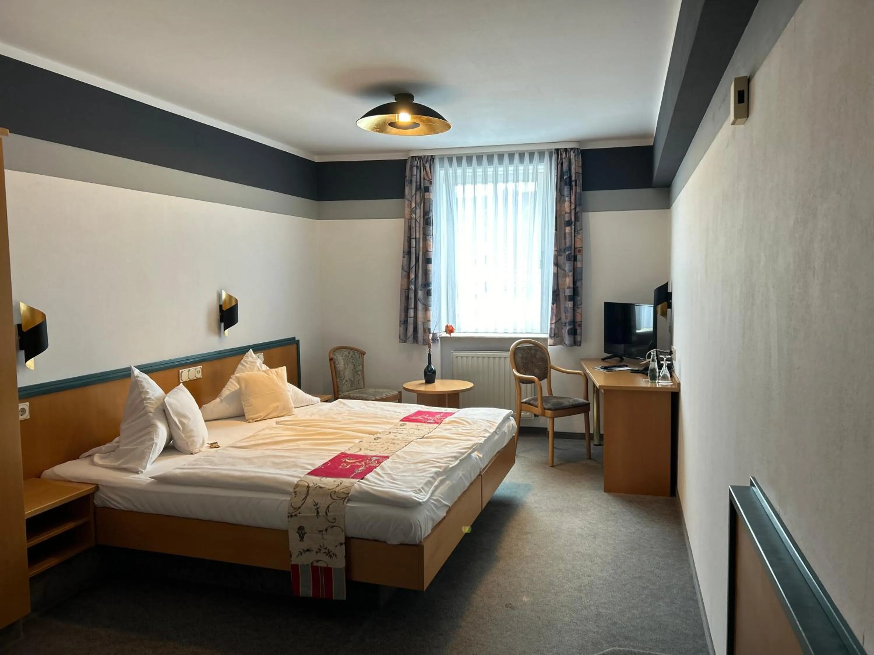 Bed in Hotel Bebra's Hessischer Hof