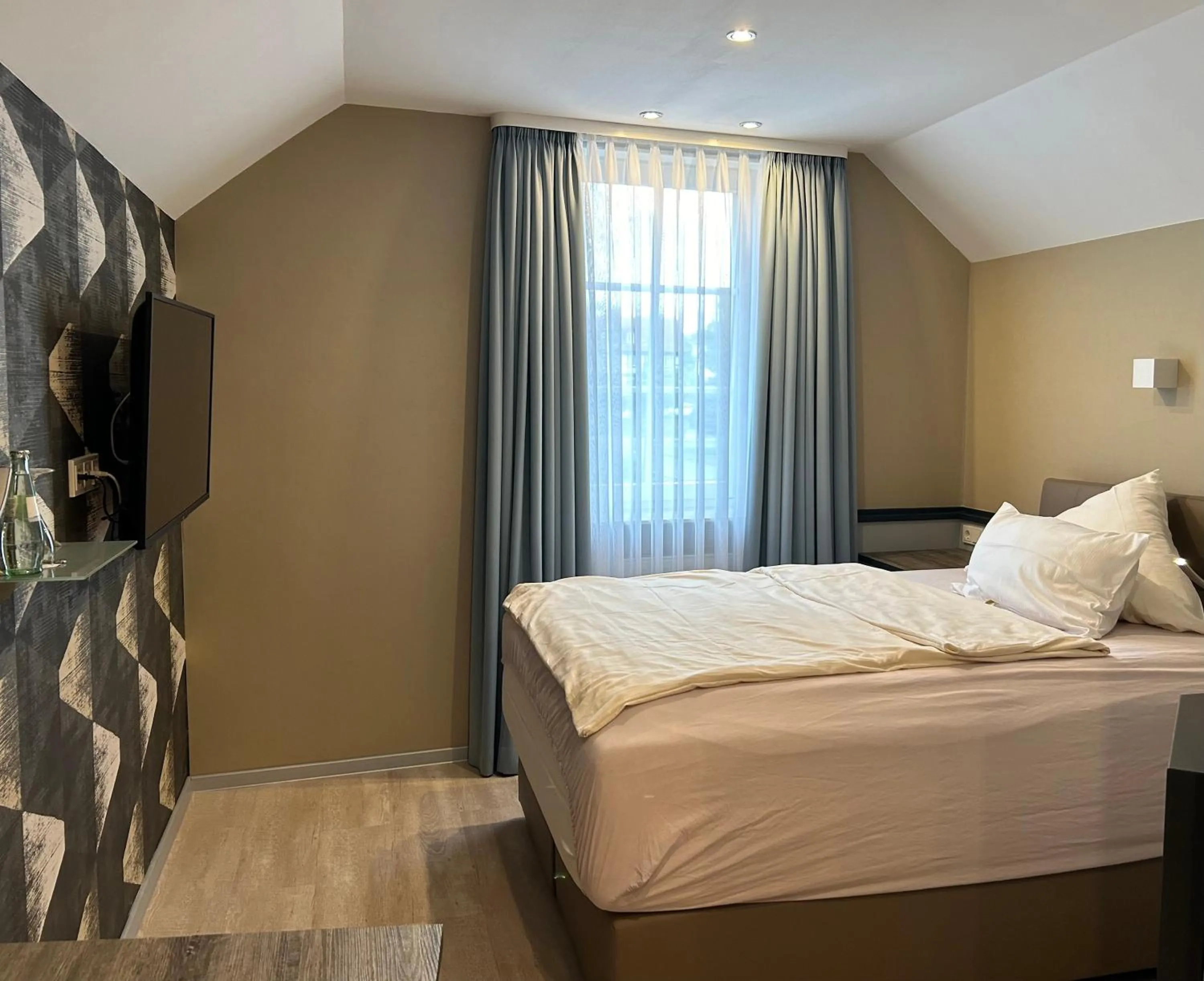 Bed in Hotel Bebra's Hessischer Hof