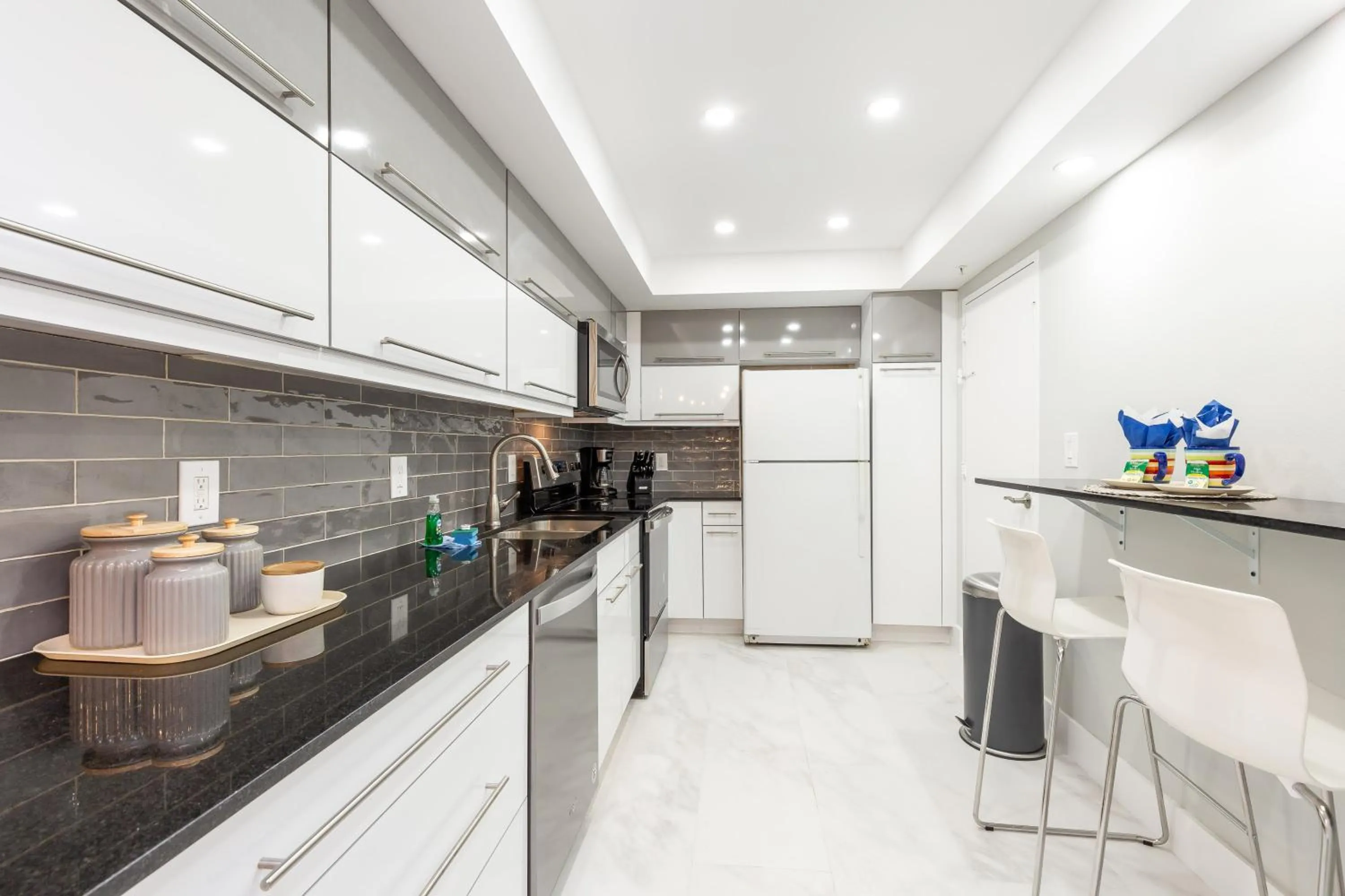 Kitchen or kitchenette in The Tides Ocean Luxury Suites