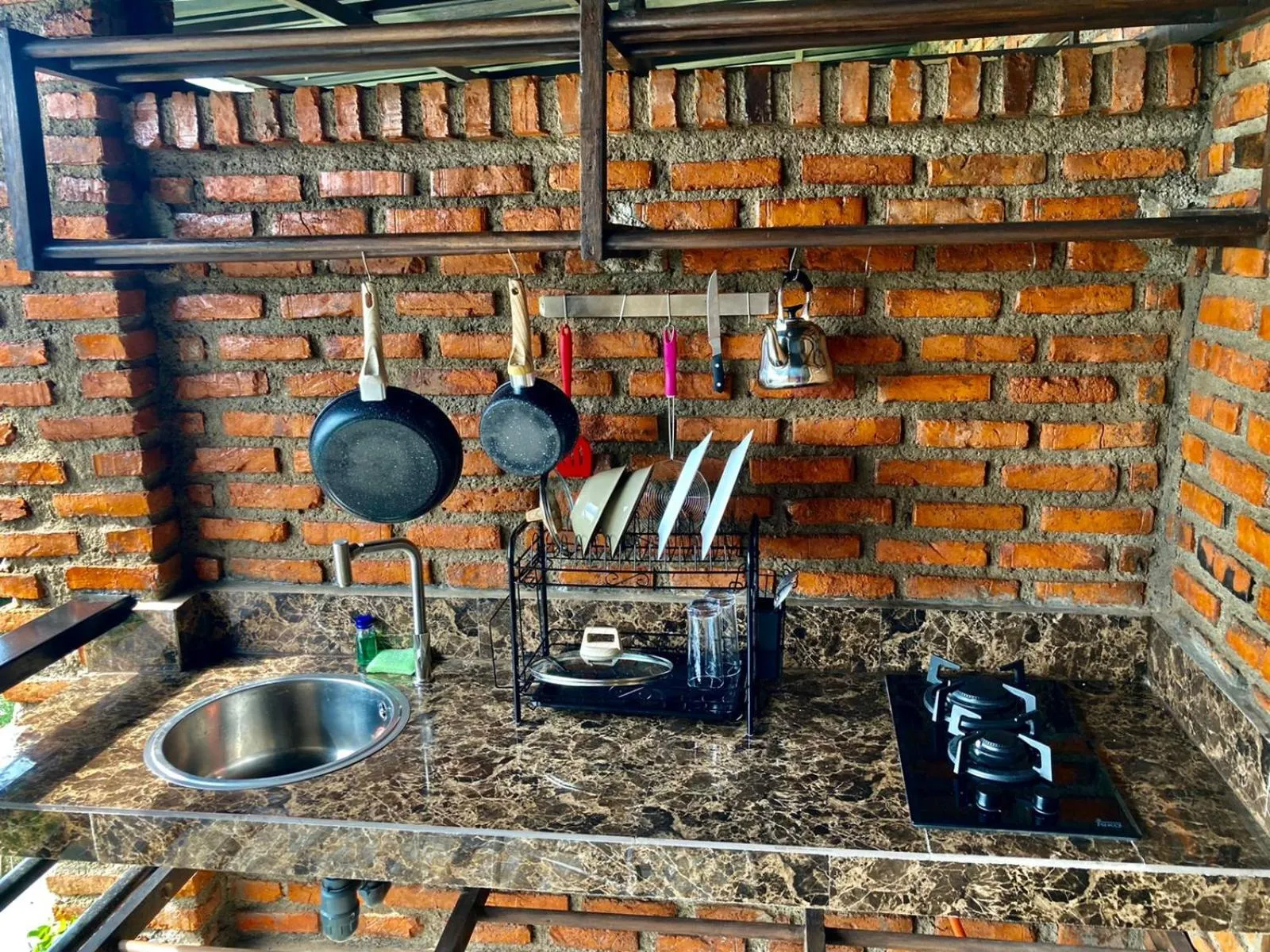 Kitchen or kitchenette in Vila NJD