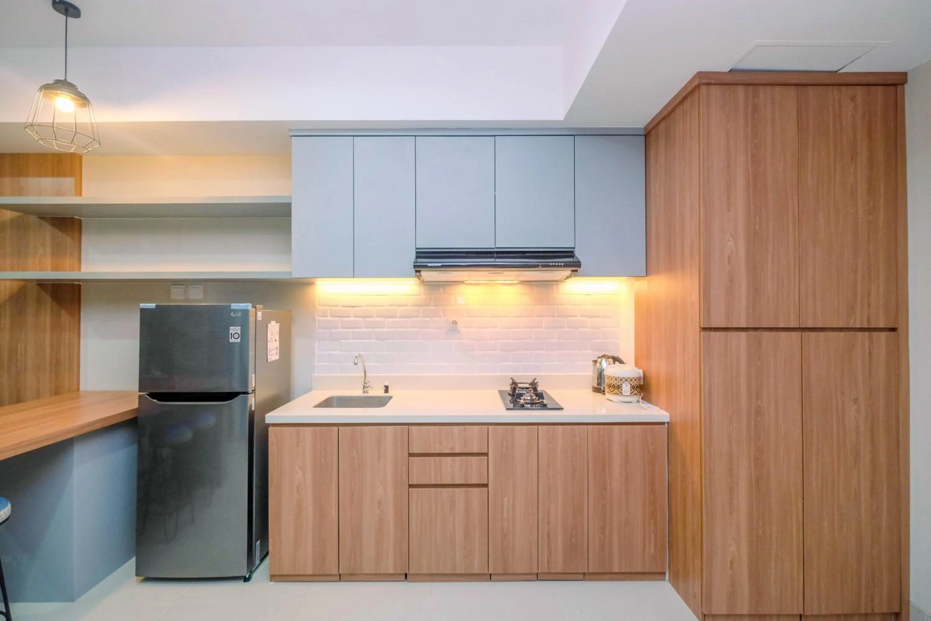 Cozy 2BR Apartment Nine Residence with City View By Travelio