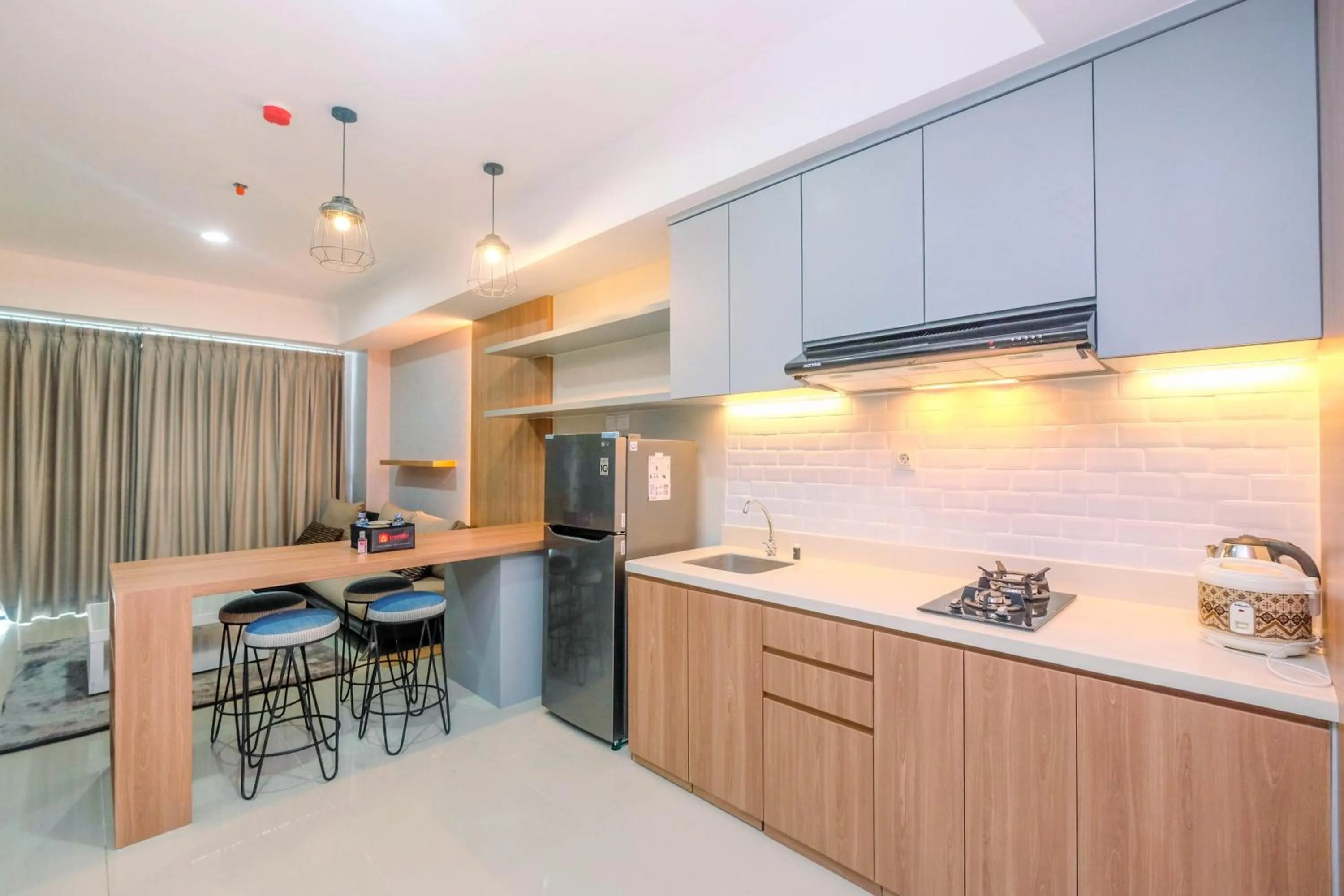 Cozy 2BR Apartment Nine Residence with City View By Travelio