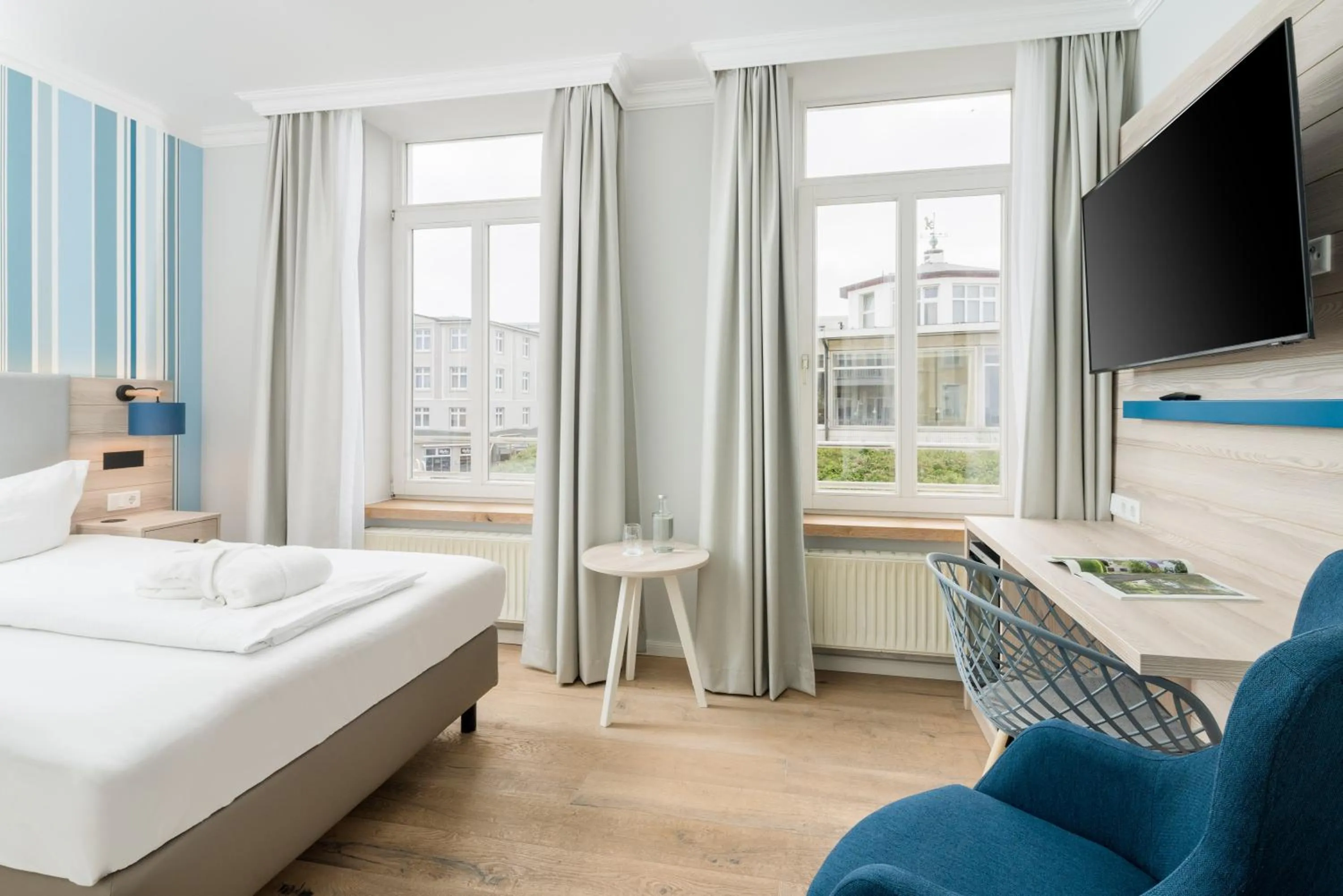 Photo of the whole room, Bed in Strandhotel Gerken