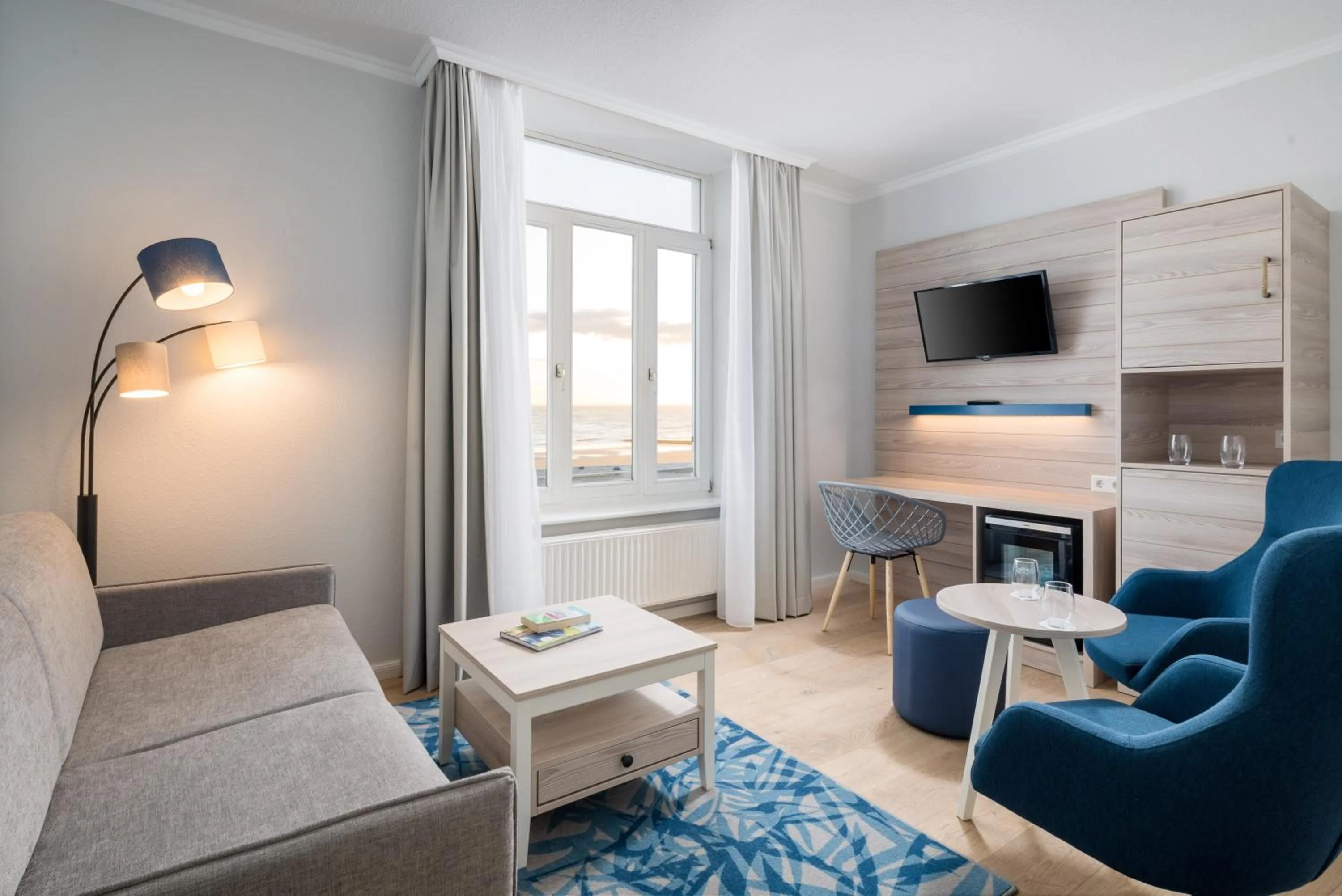 Living room, Bed in Strandhotel Gerken