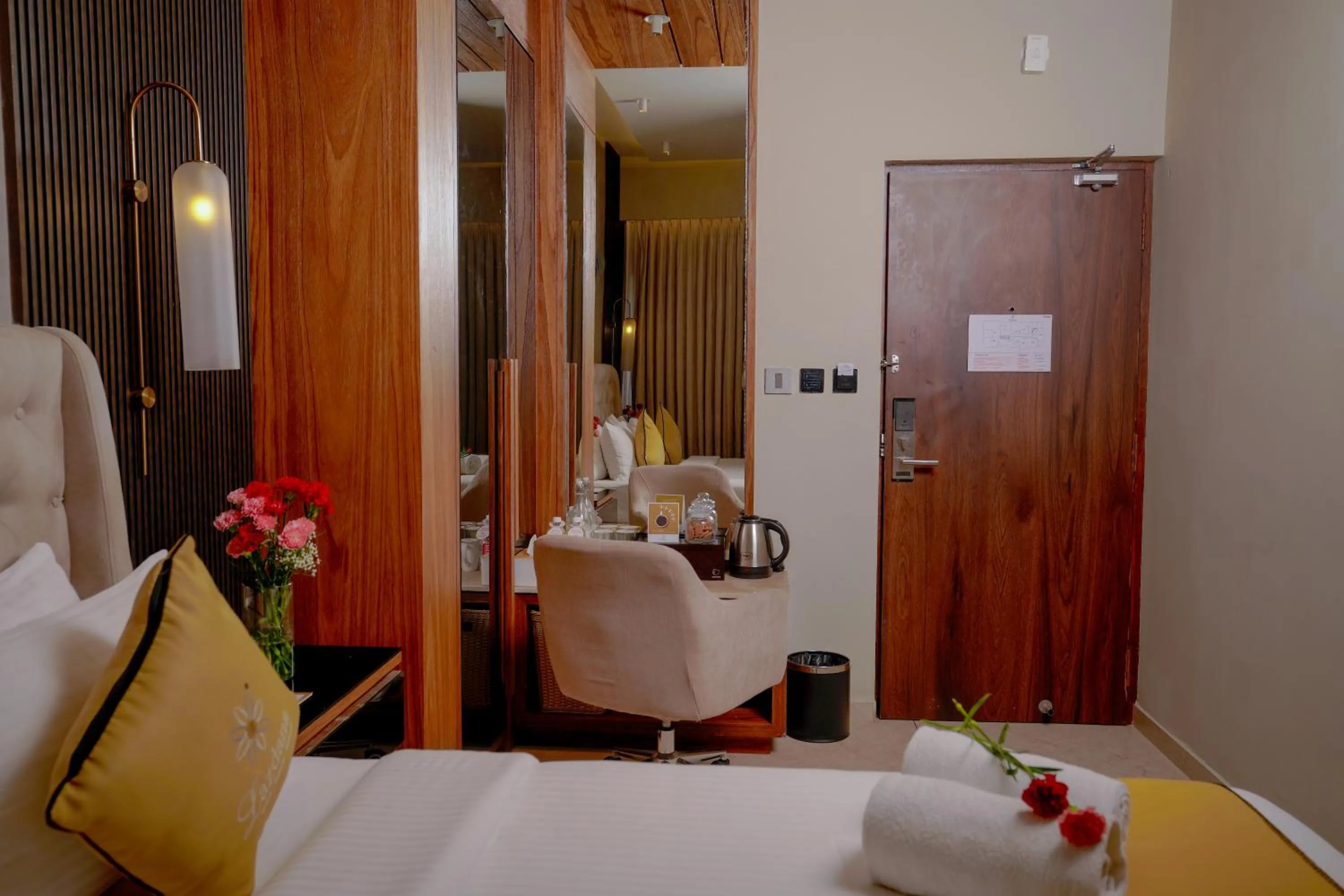 Bed in Lazdana Hotel Bangalore