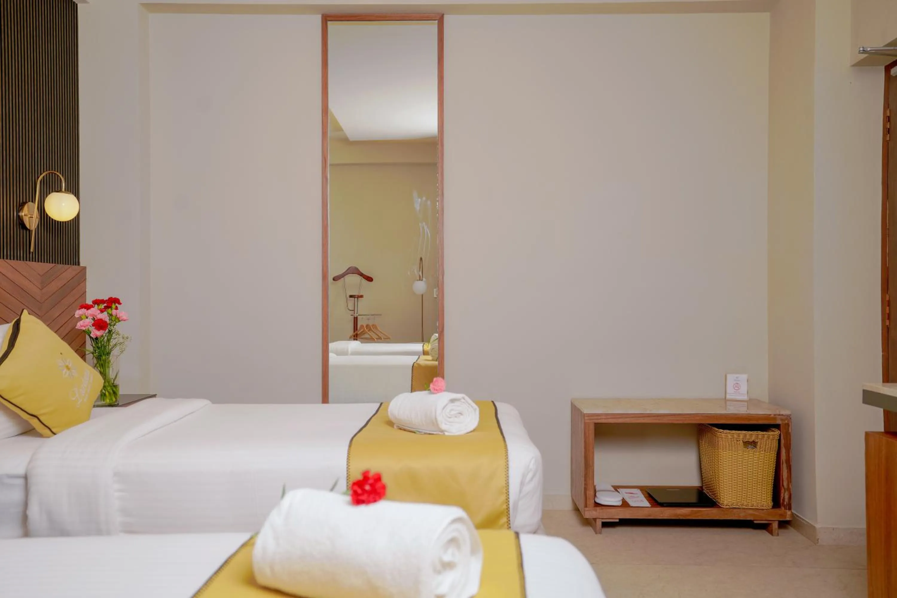 Bed in Lazdana Hotel Bangalore