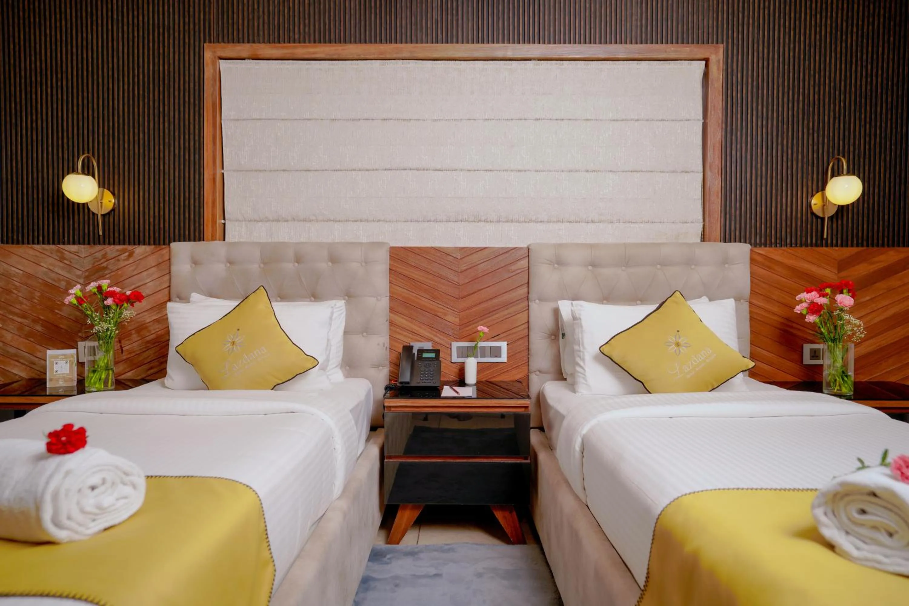 Bed in Lazdana Hotel Bangalore