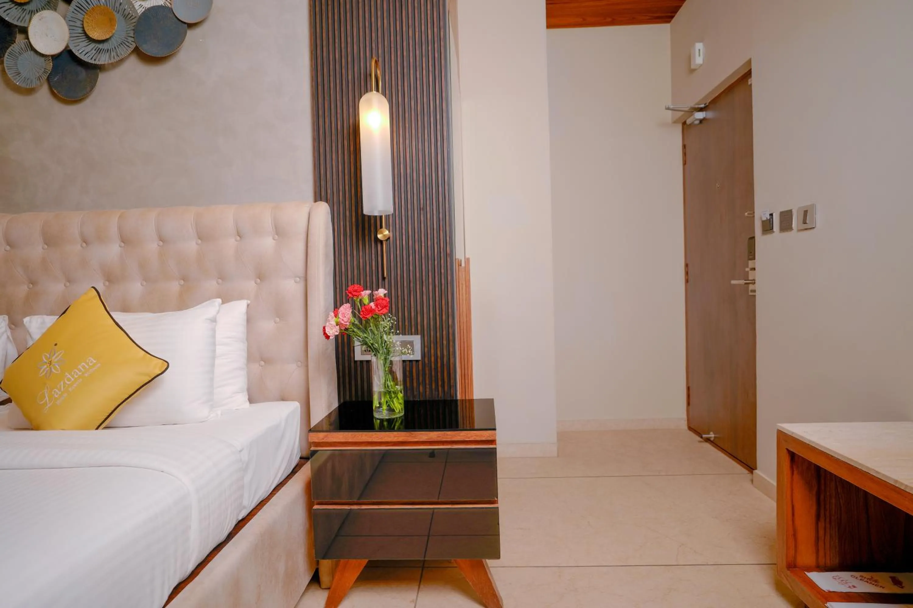 Bed in Lazdana Hotel Bangalore