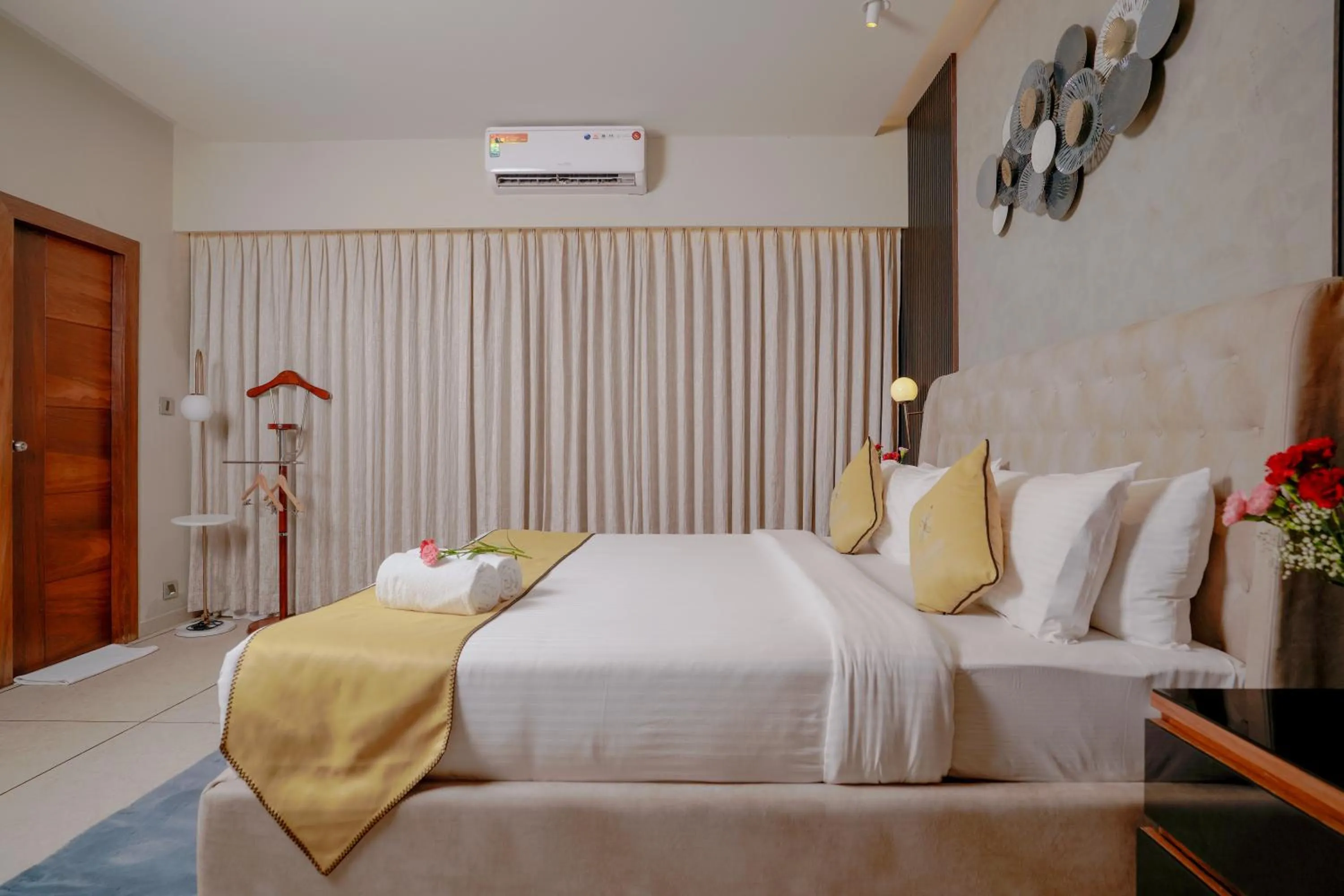 Bed in Lazdana Hotel Bangalore