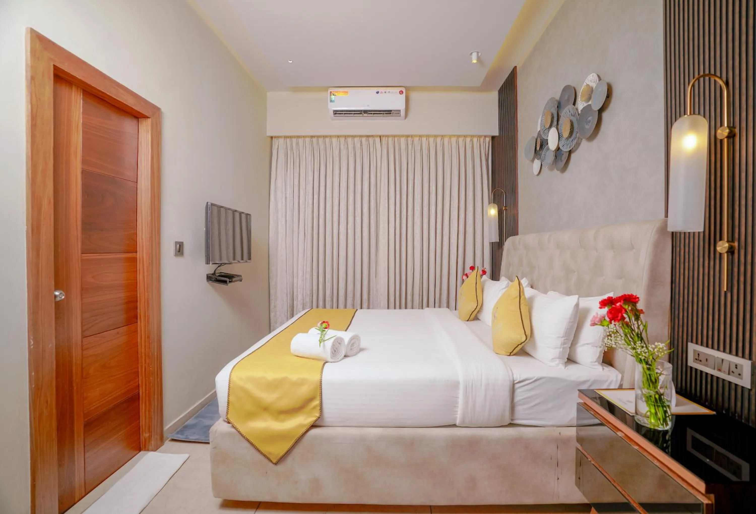 Bed in Lazdana Hotel Bangalore