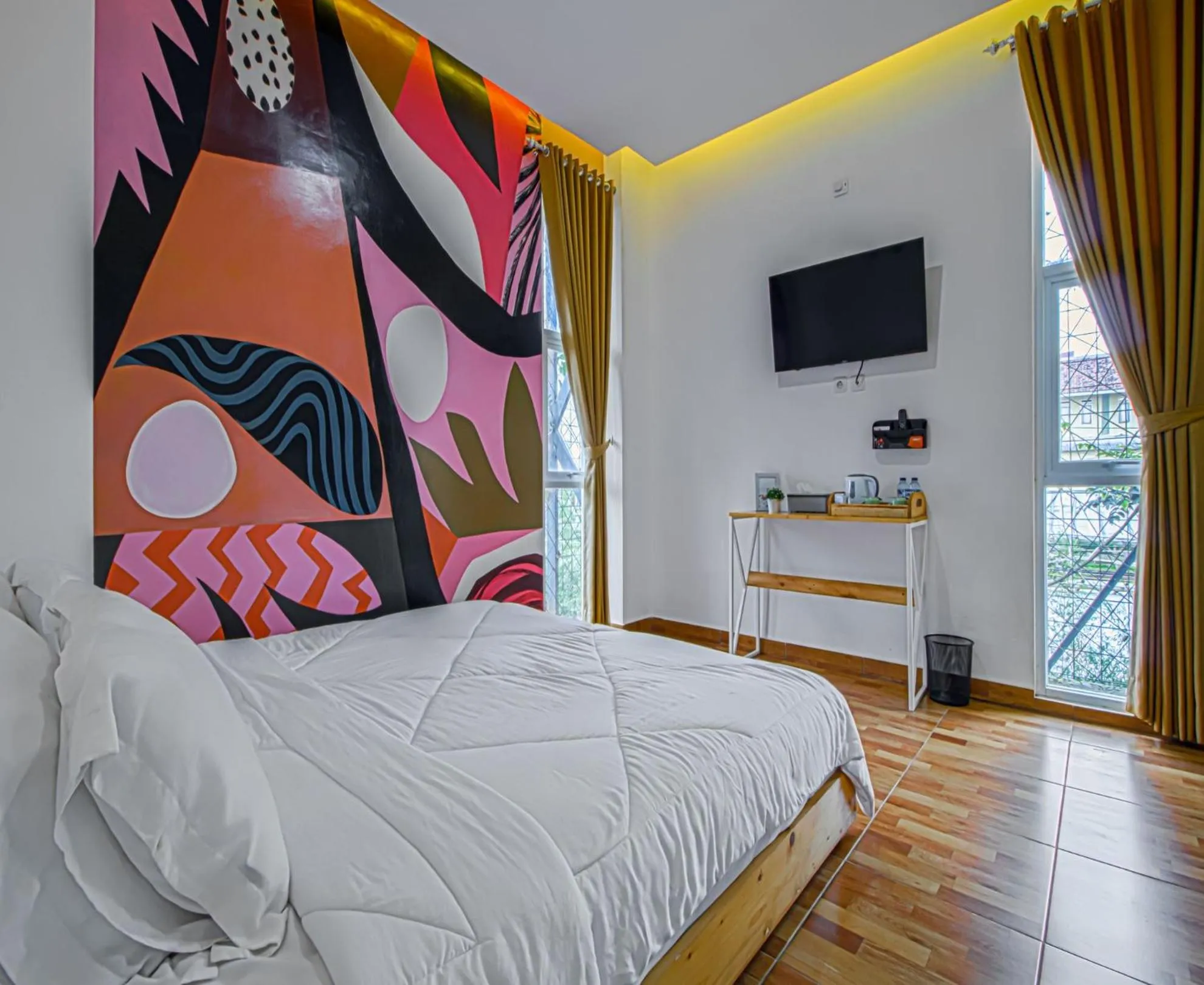 Bedroom, TV/Entertainment Center in D'Journey Hotel