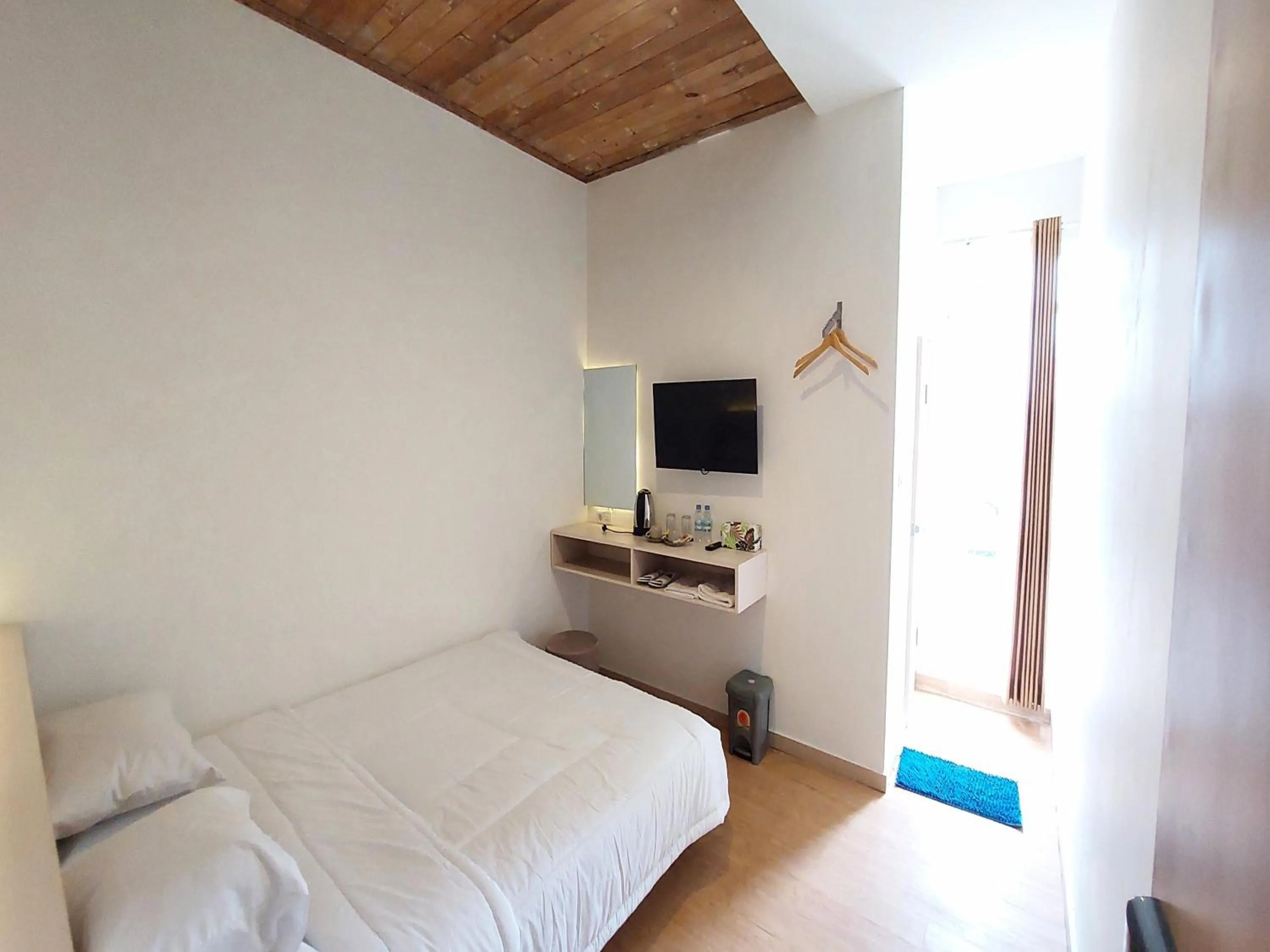 Bedroom, TV/Entertainment Center in D'Journey Hotel