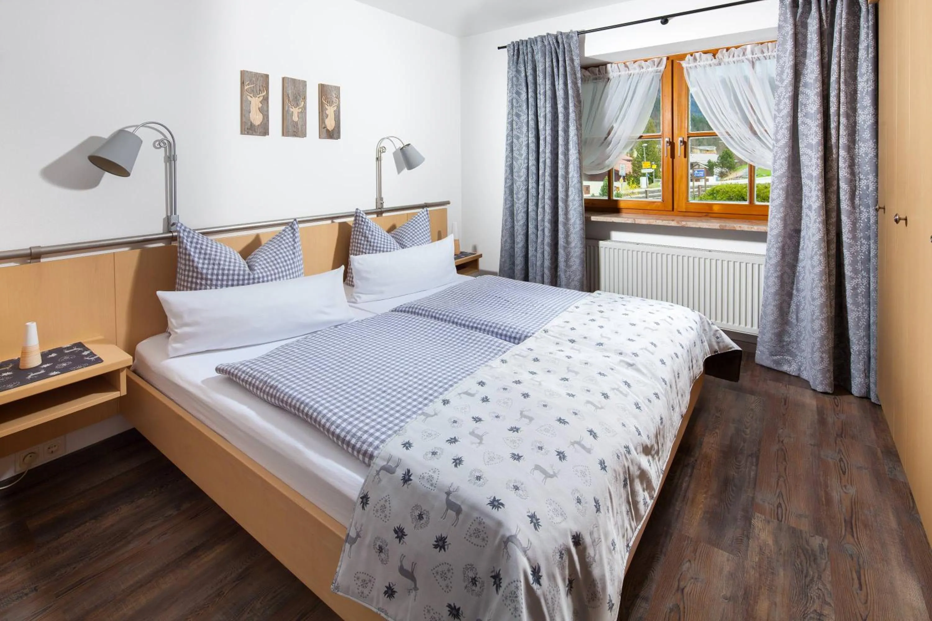 Bed in Gästehaus und Ferienwohnungen Egglerlehen