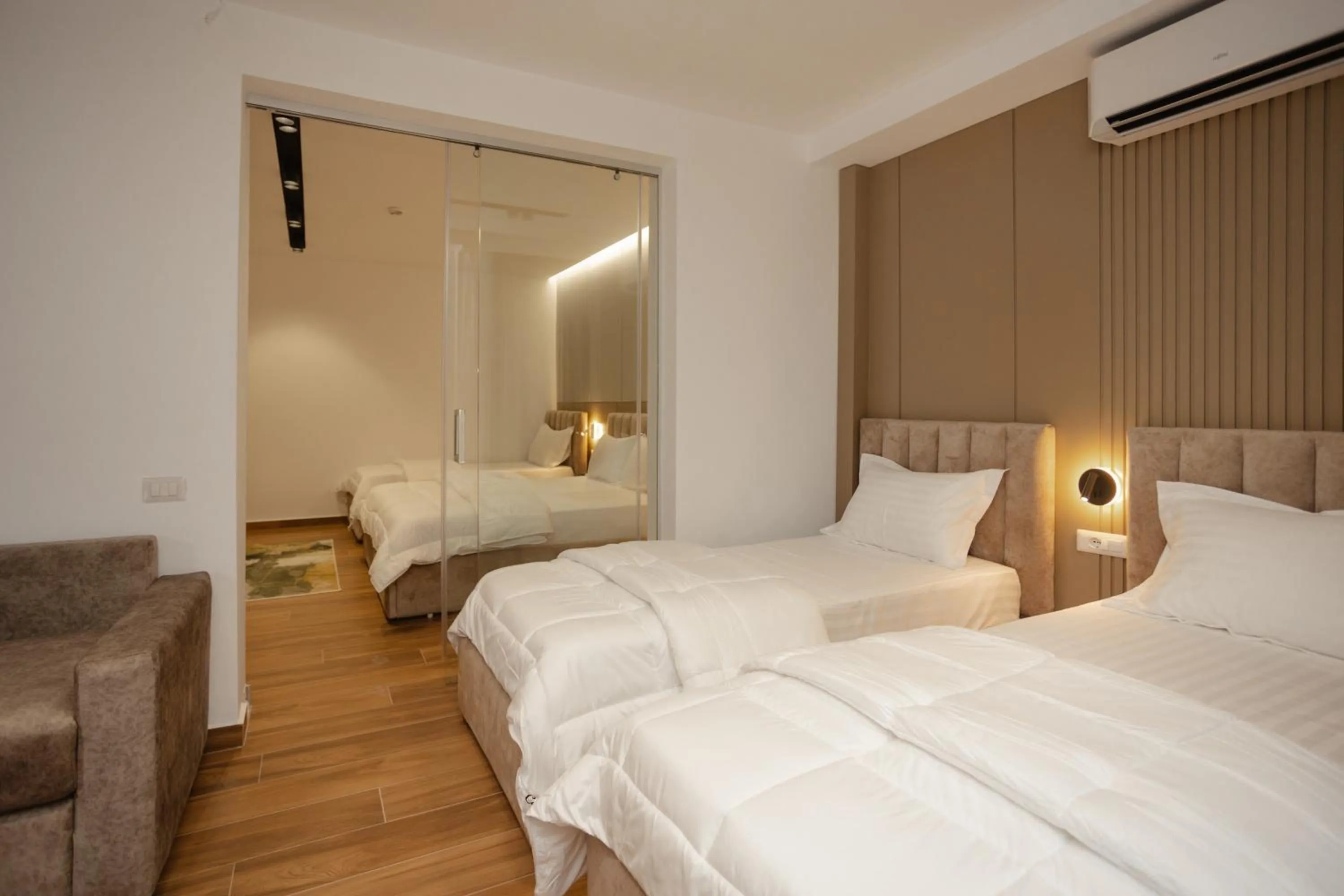 Photo of the whole room, Bed in KOMPLEKSI ROYAL