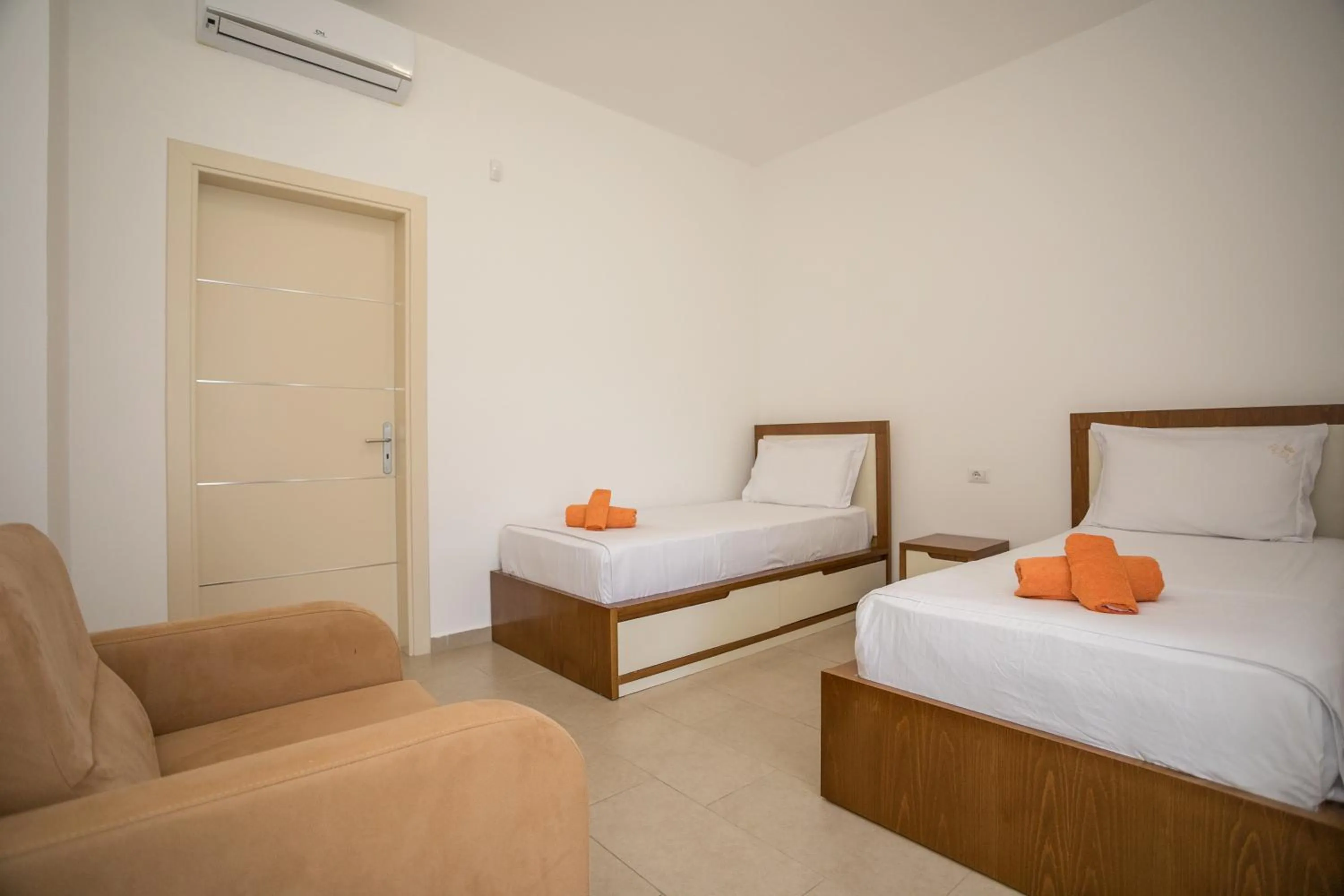 Photo of the whole room, Bed in KOMPLEKSI ROYAL