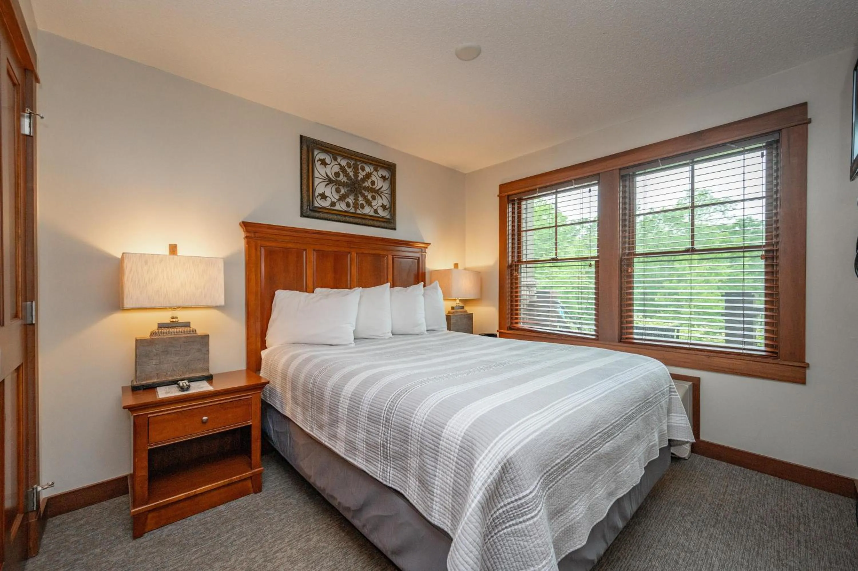 Bed in A115 One Bedroom Lake View