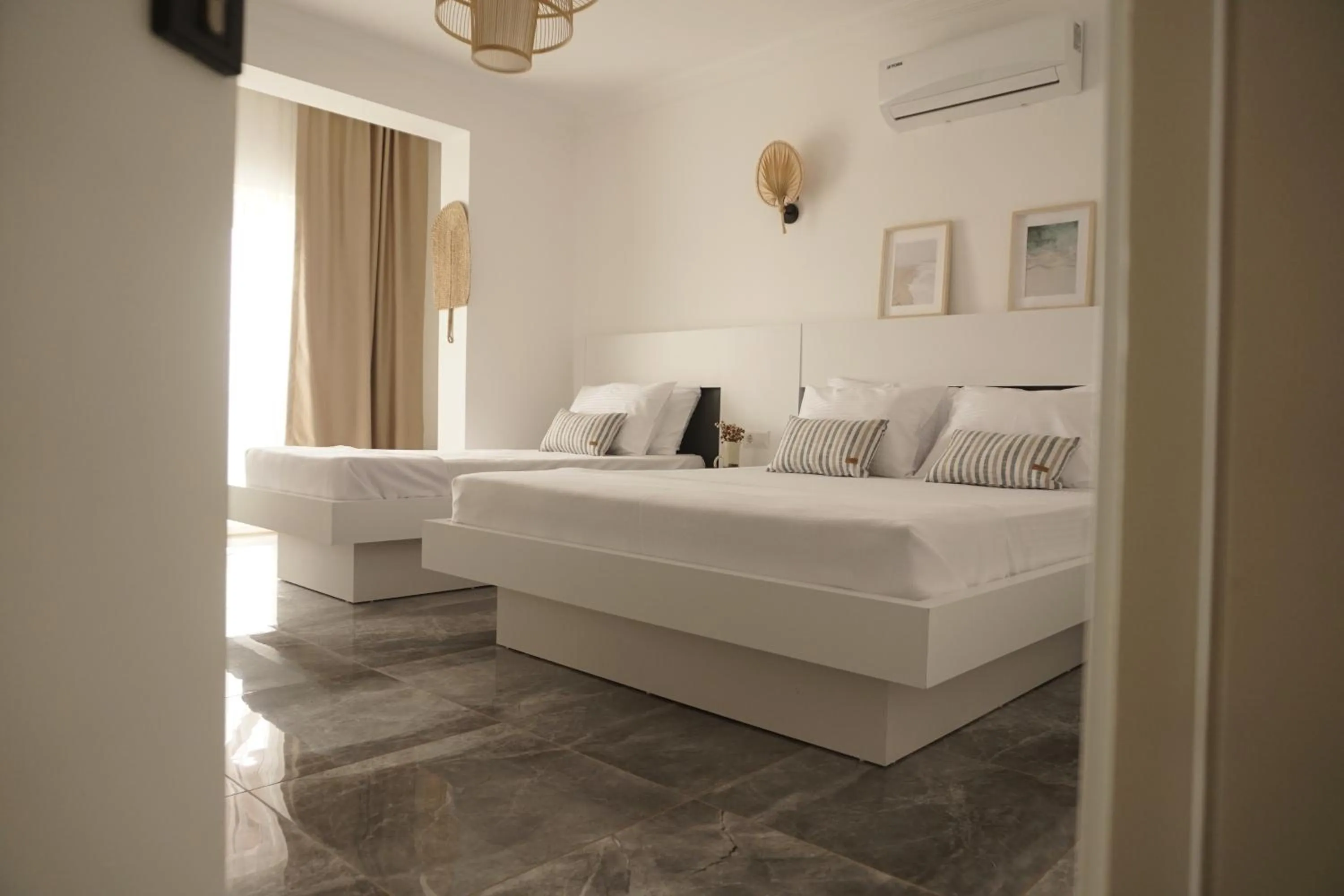 Bed in Blue Island Luxury Hotel Adults Only