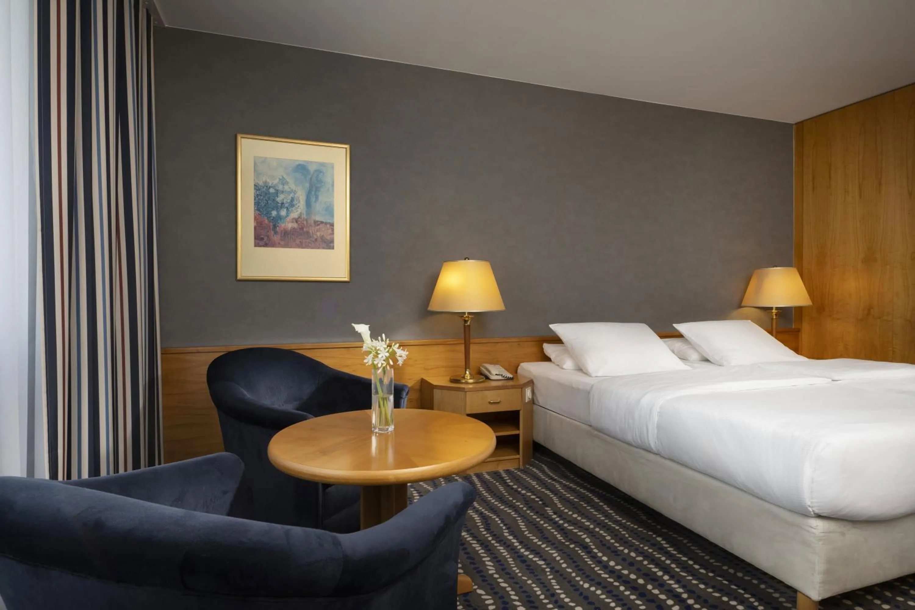 Photo of the whole room, Bed in Maritim Hotel Magdeburg
