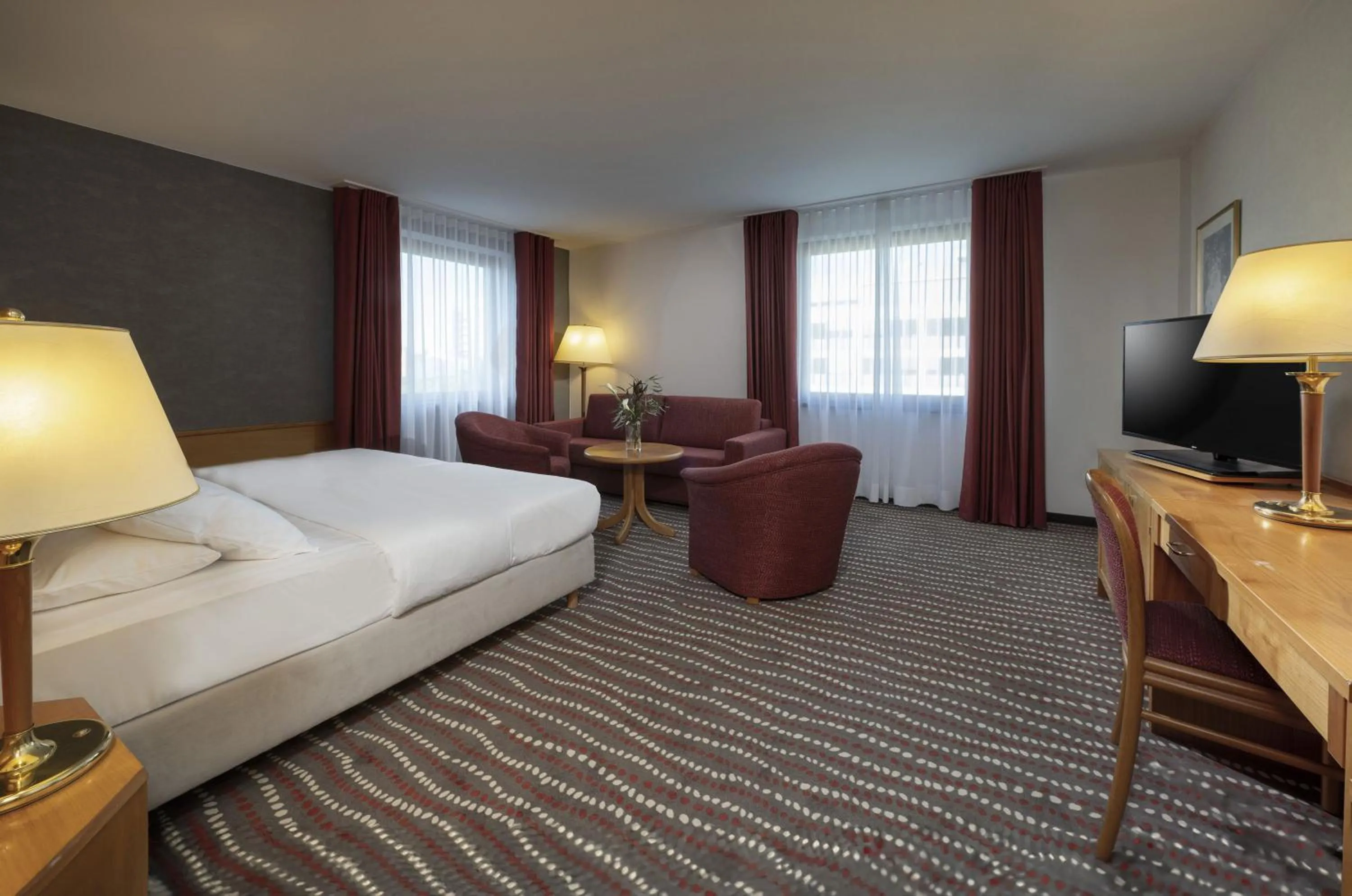 Photo of the whole room, Bed in Maritim Hotel Magdeburg